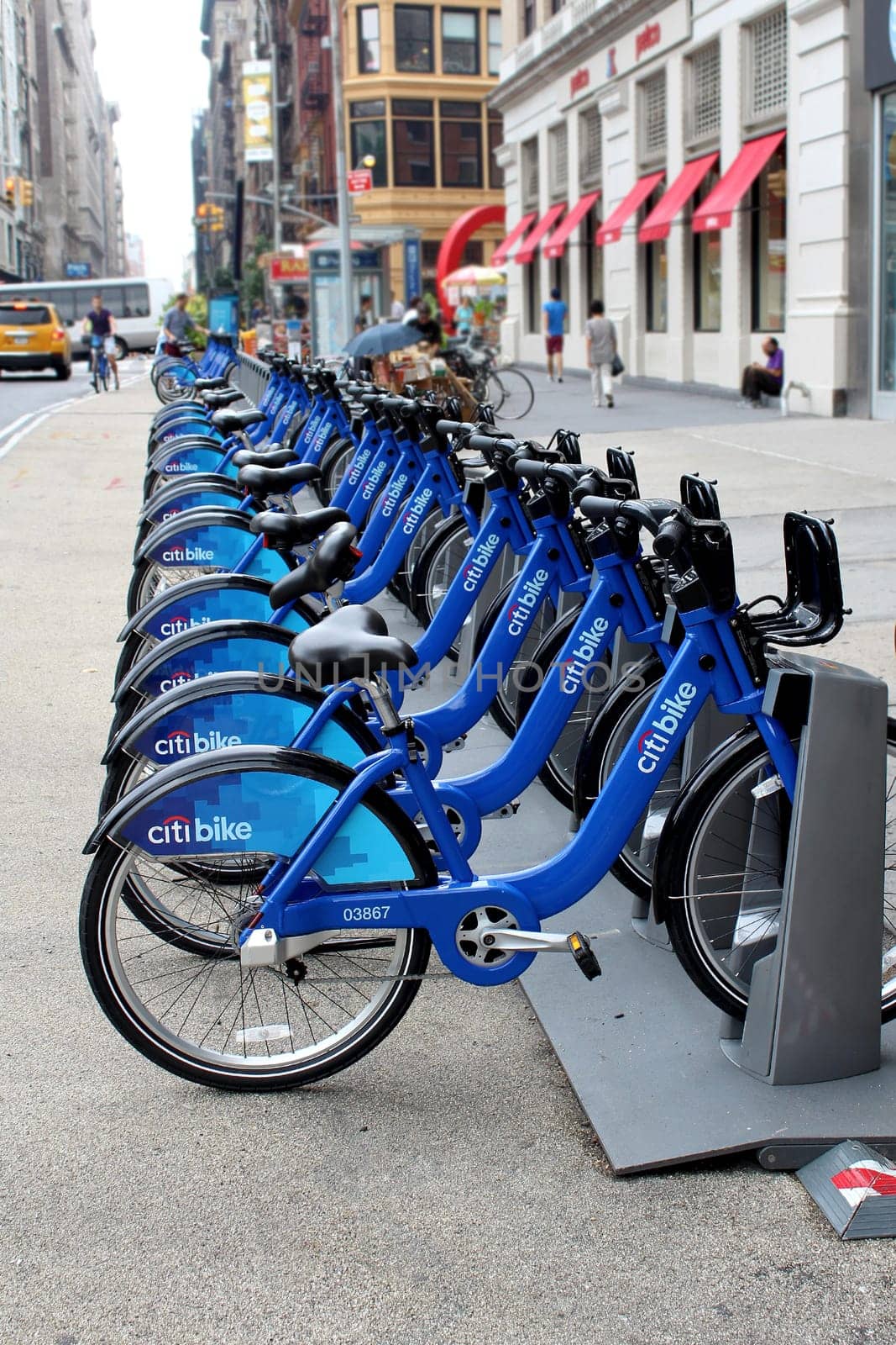 NEW YORK -  SEPTEMBER 02: Citi Bike docking station on September 02, 2013 in New York. Citi Bike is a privately owned for-profit public bicycle sharing system, intended to provide people with an additional transportation option for getting around New York City.
