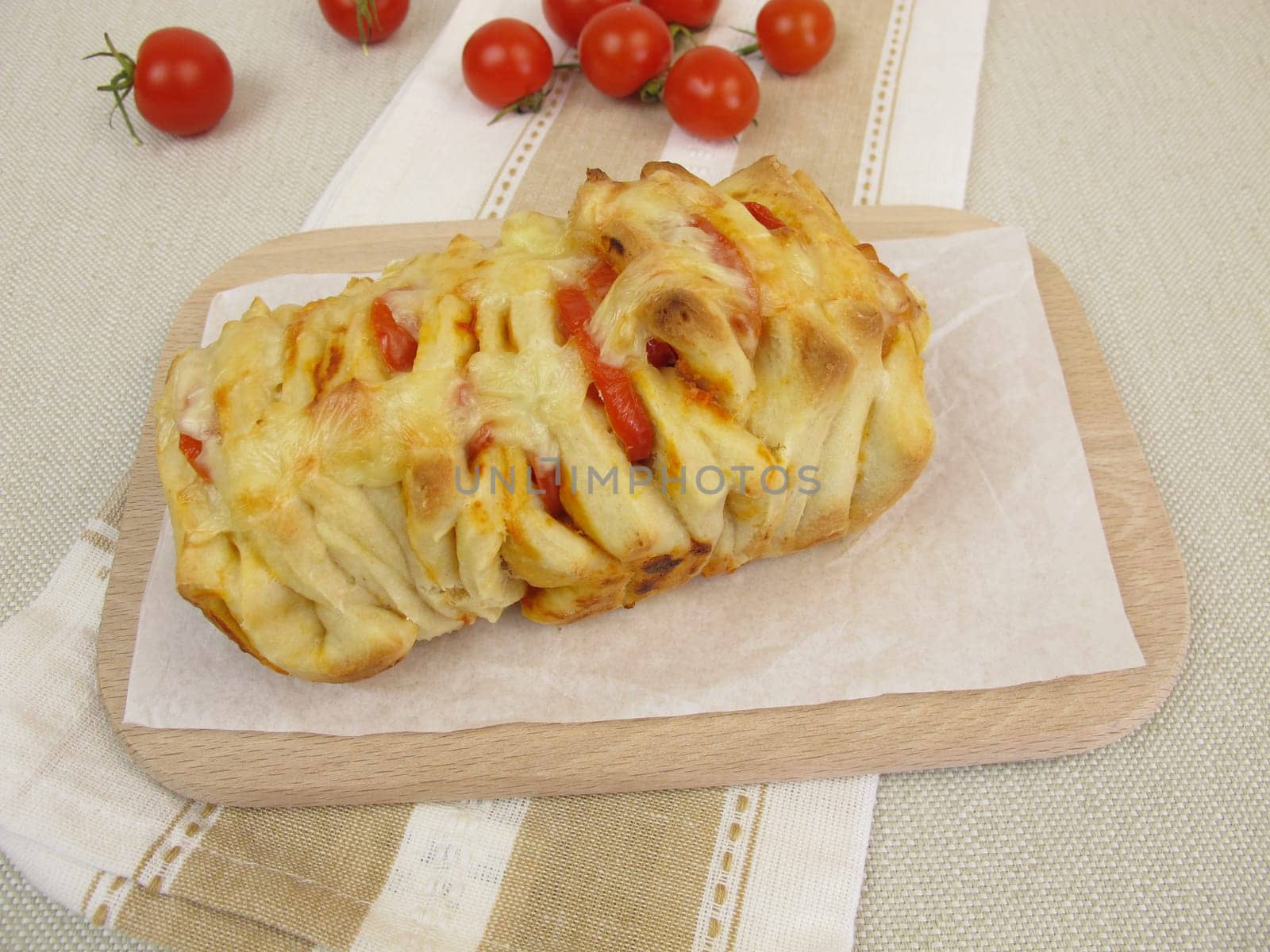 Pizza plucked bread with tomatoes and cheese