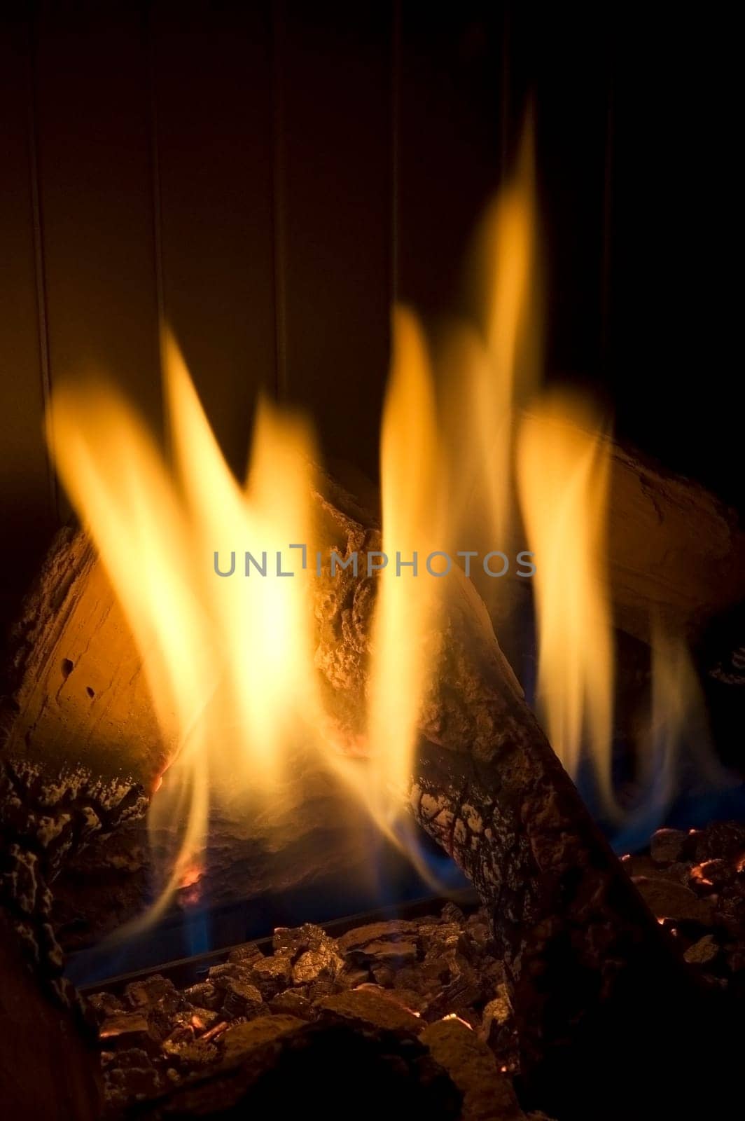 Closeup of a cosy and warm fireplace. Long shutterspeed.