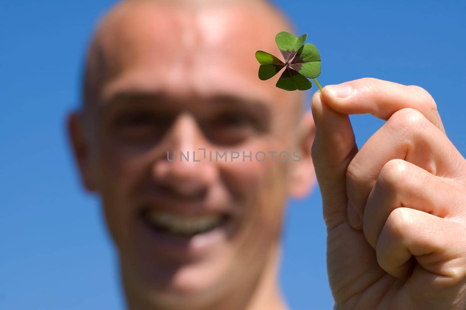 This man found a four leave clover, it's his lucky day!