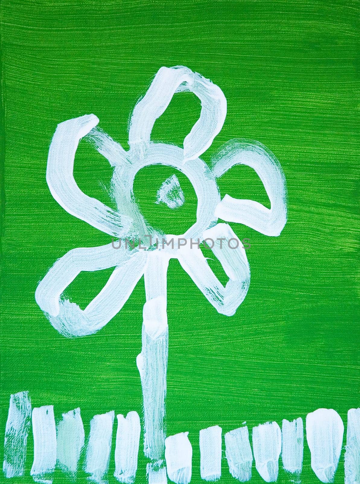 Children's painting of a flower, on green painted canvas.