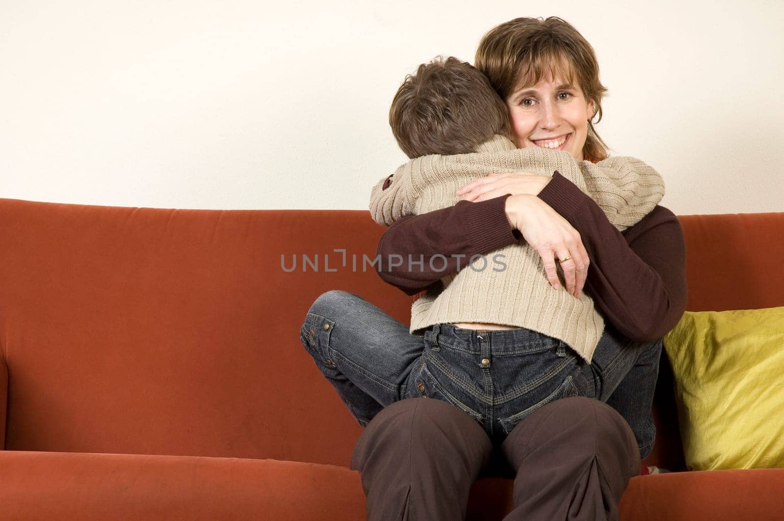 Mother holding her son.