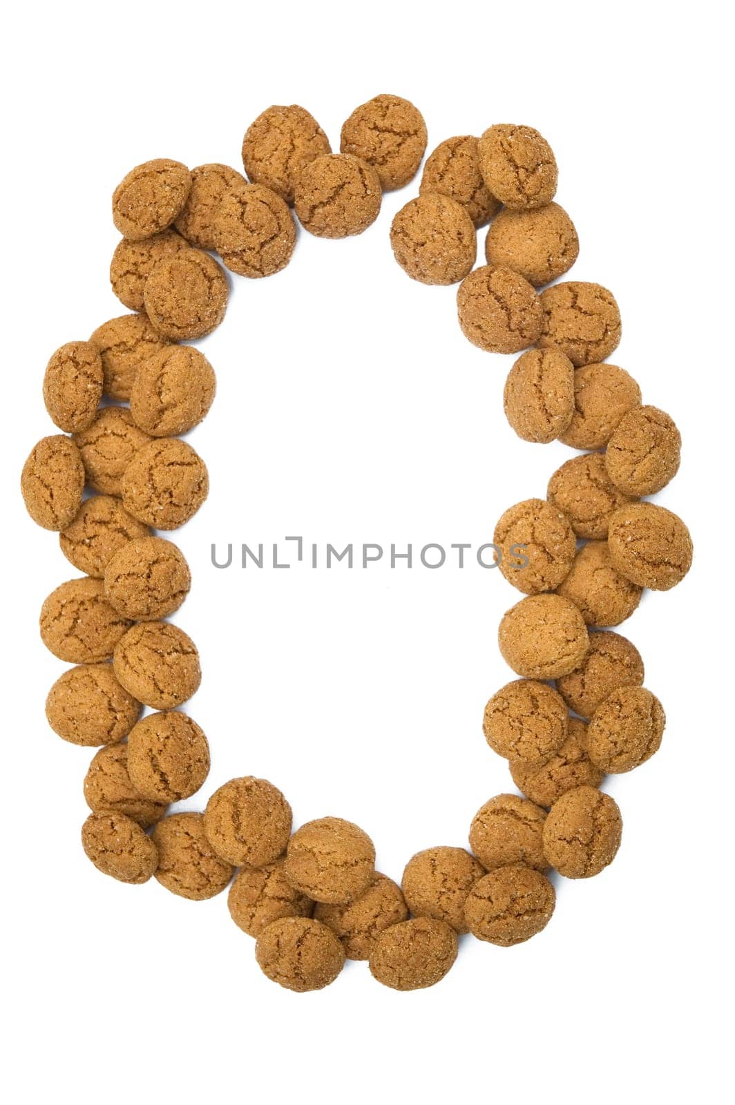 Little ginger nuts in the form of the digit zero. These little ginger nuts are used in Holland for the "Sinterklaas"" party, which is at Dec 5 every year. Sinterklaas is a sort of Santa Claus. In Holland these ginger nuts are called ""pepernoot"". Isolated on white."
