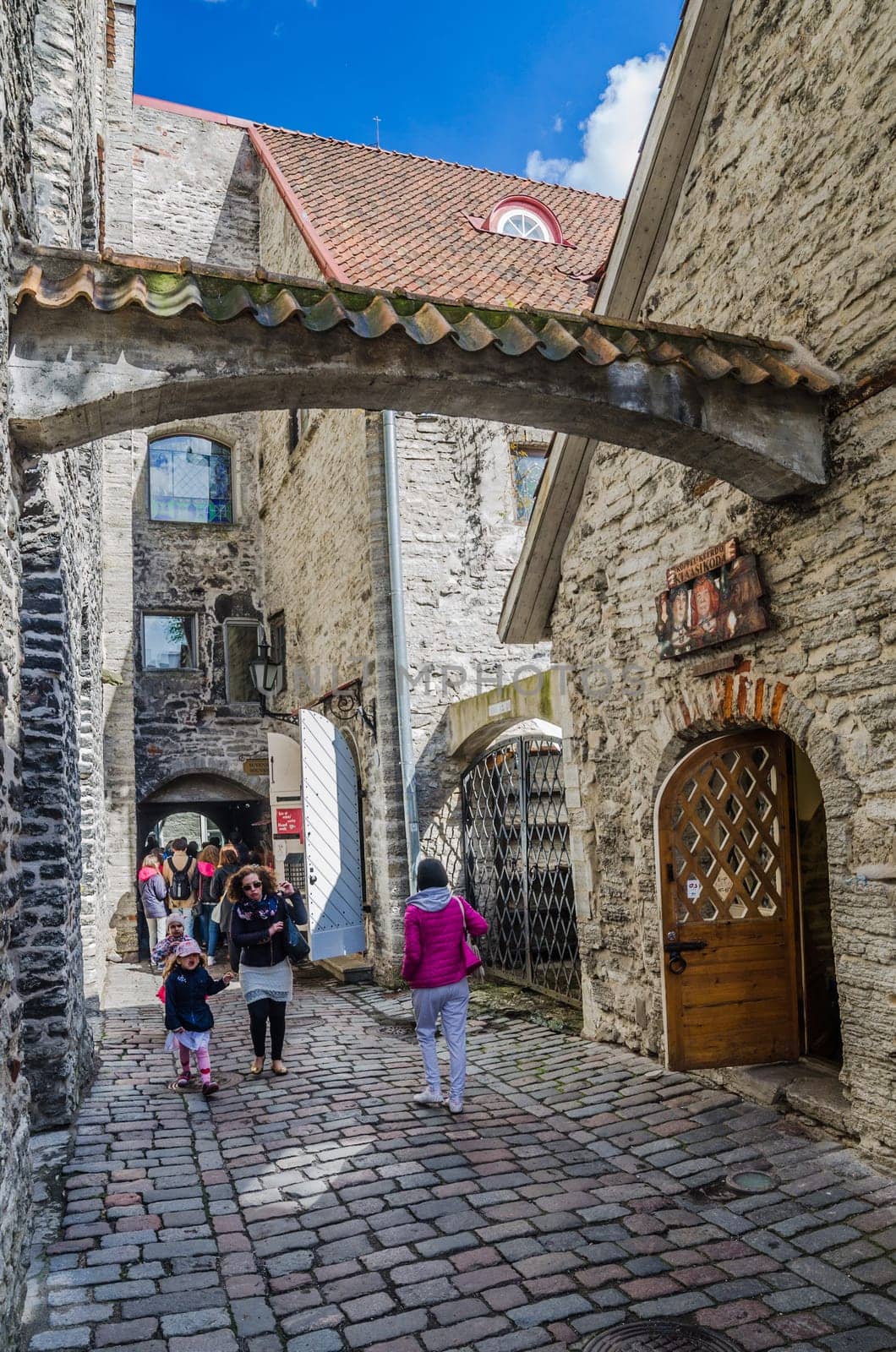 TALLINN, ESTONIA - MAY 31: People walk down the street in the Old Town Celebration Days On May 31, 2015 In Tallinn.