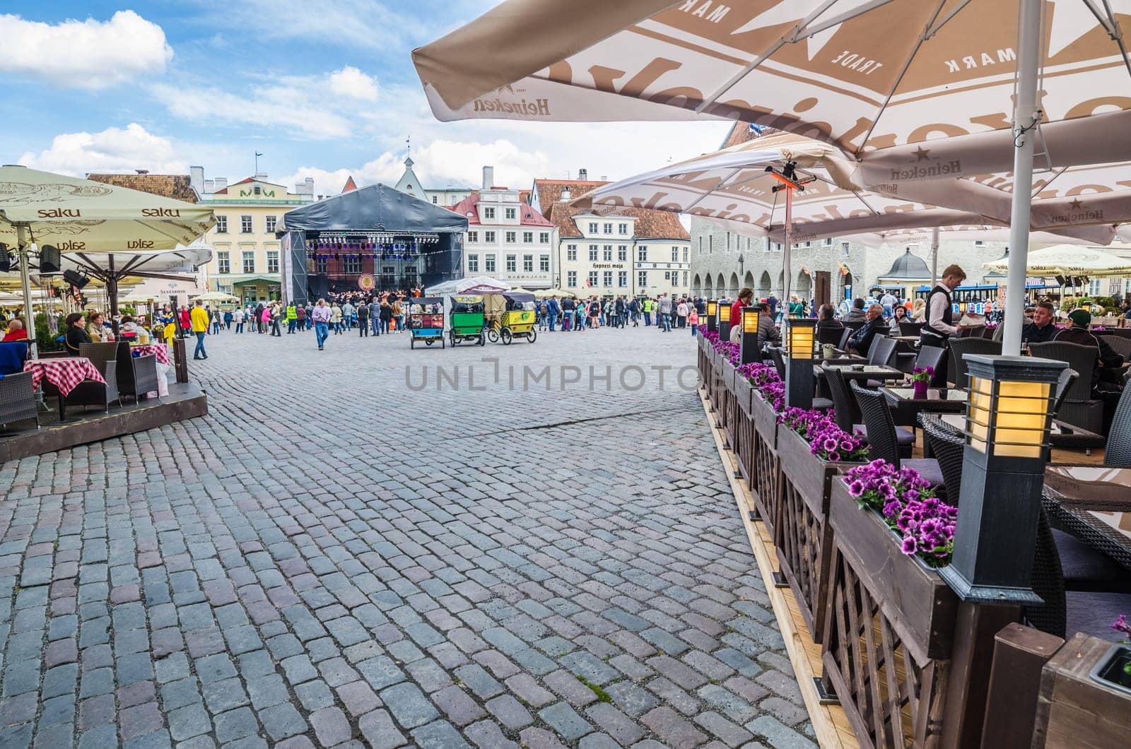 TALLINN, ESTONIA - MAY 31: People walk down the street in the Old Town Celebration Days On May 31, 2015 In Tallinn.