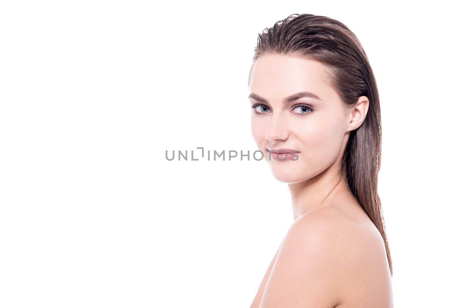 Side pose of a bare shoulder woman