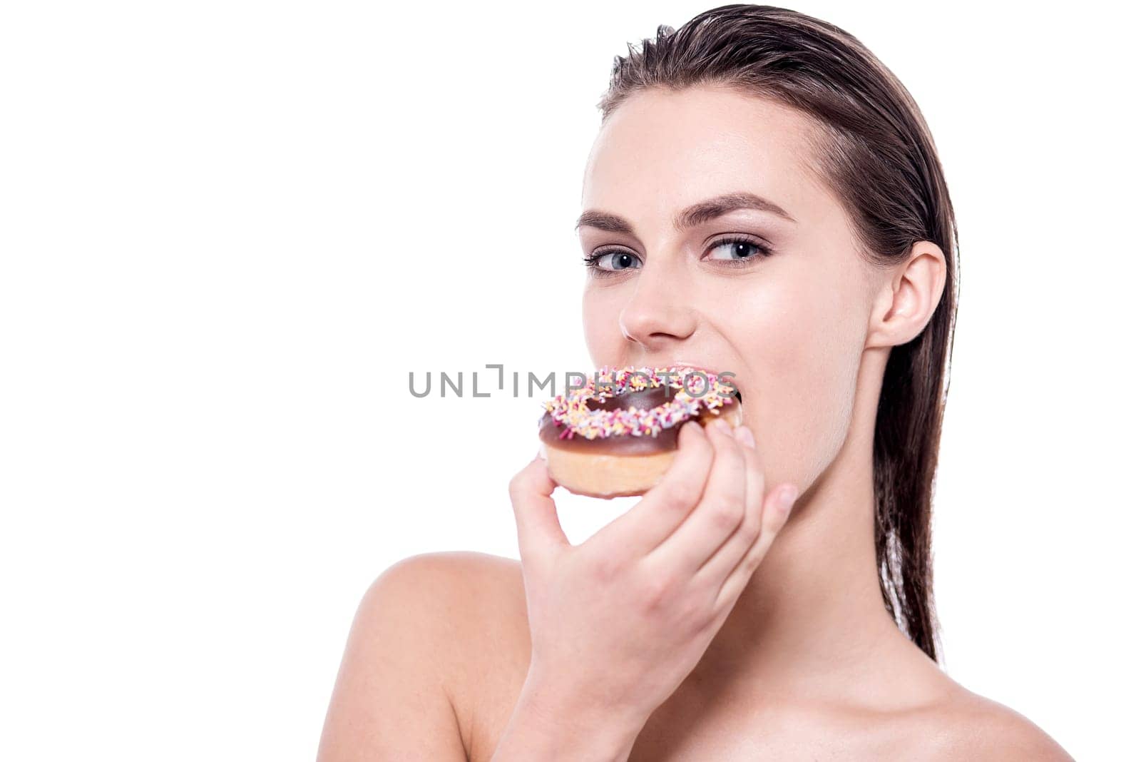 Young woman holding a sweet donut