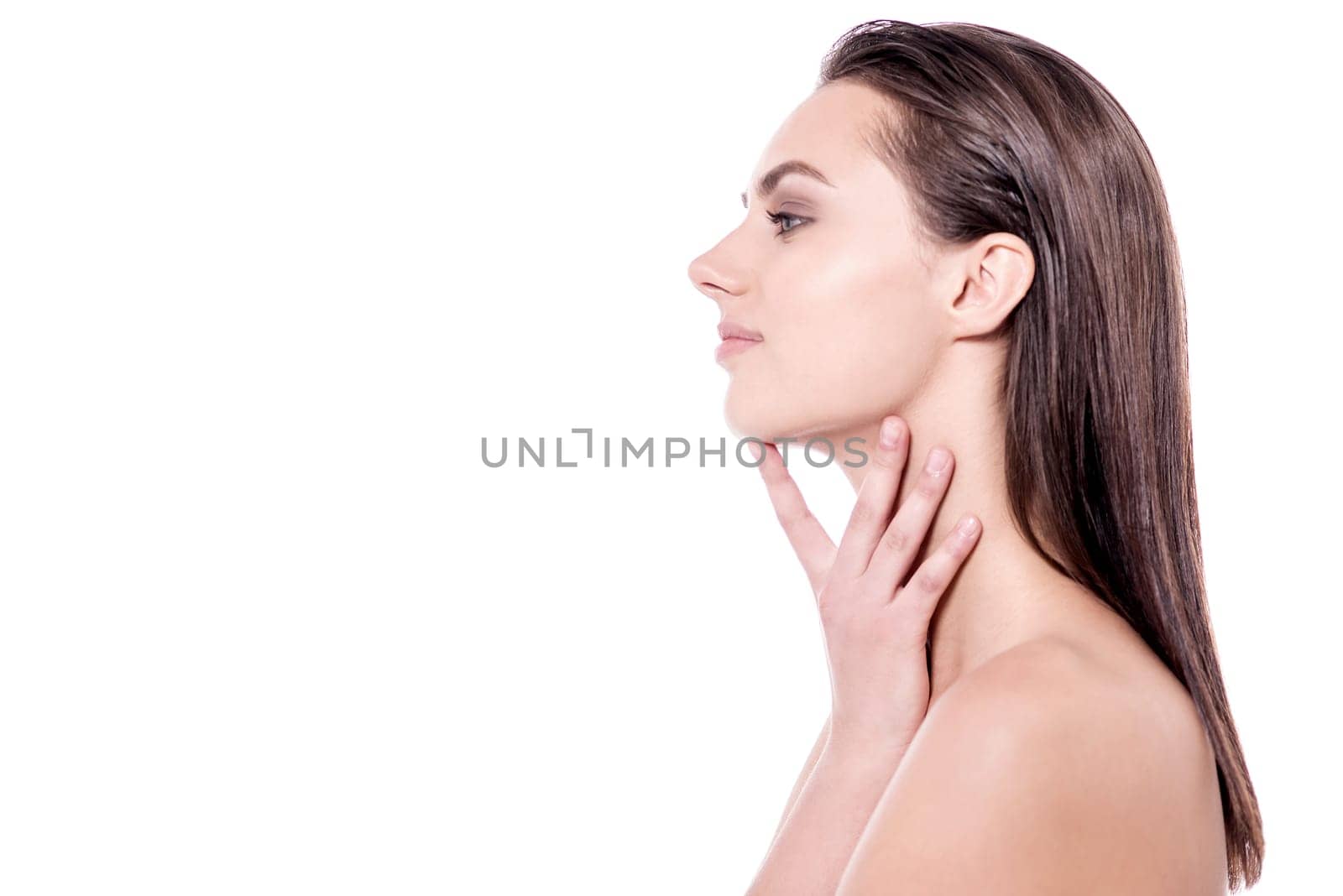 Side pose of pretty nude lady with soft skin