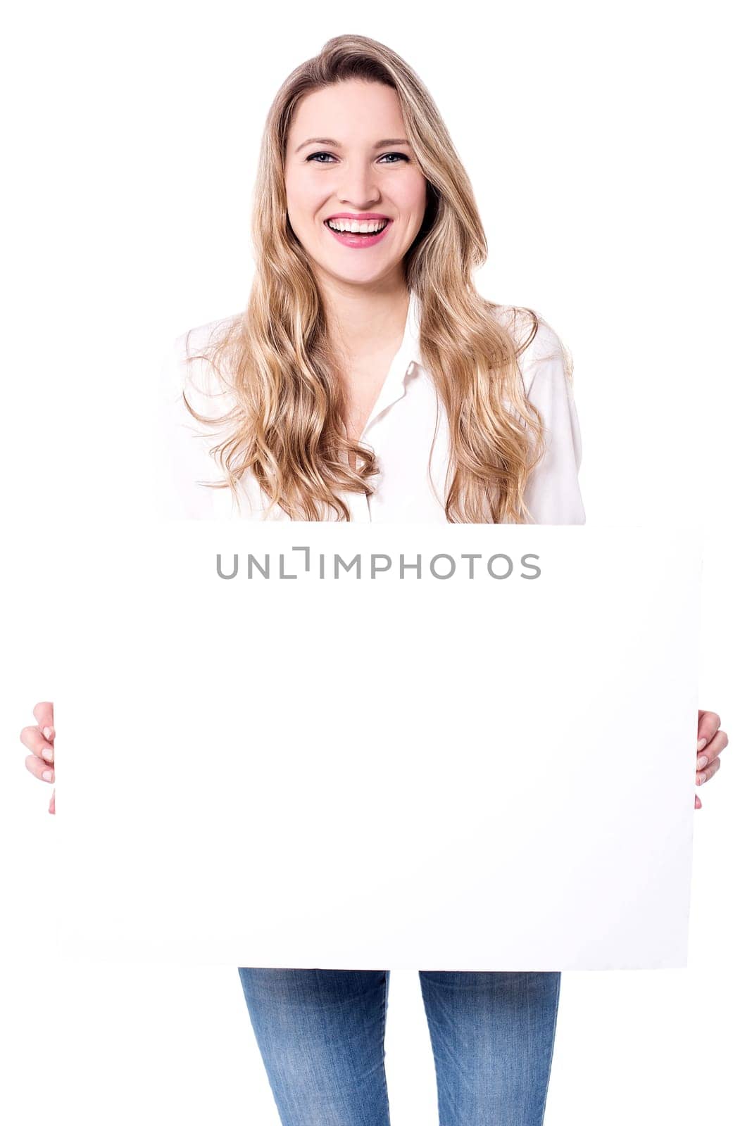 Portrait of woman holding whiteboard