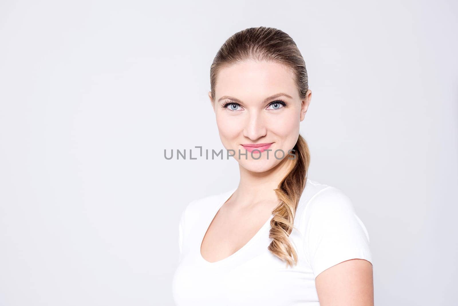 Pretty woman arresting in her blue eyes