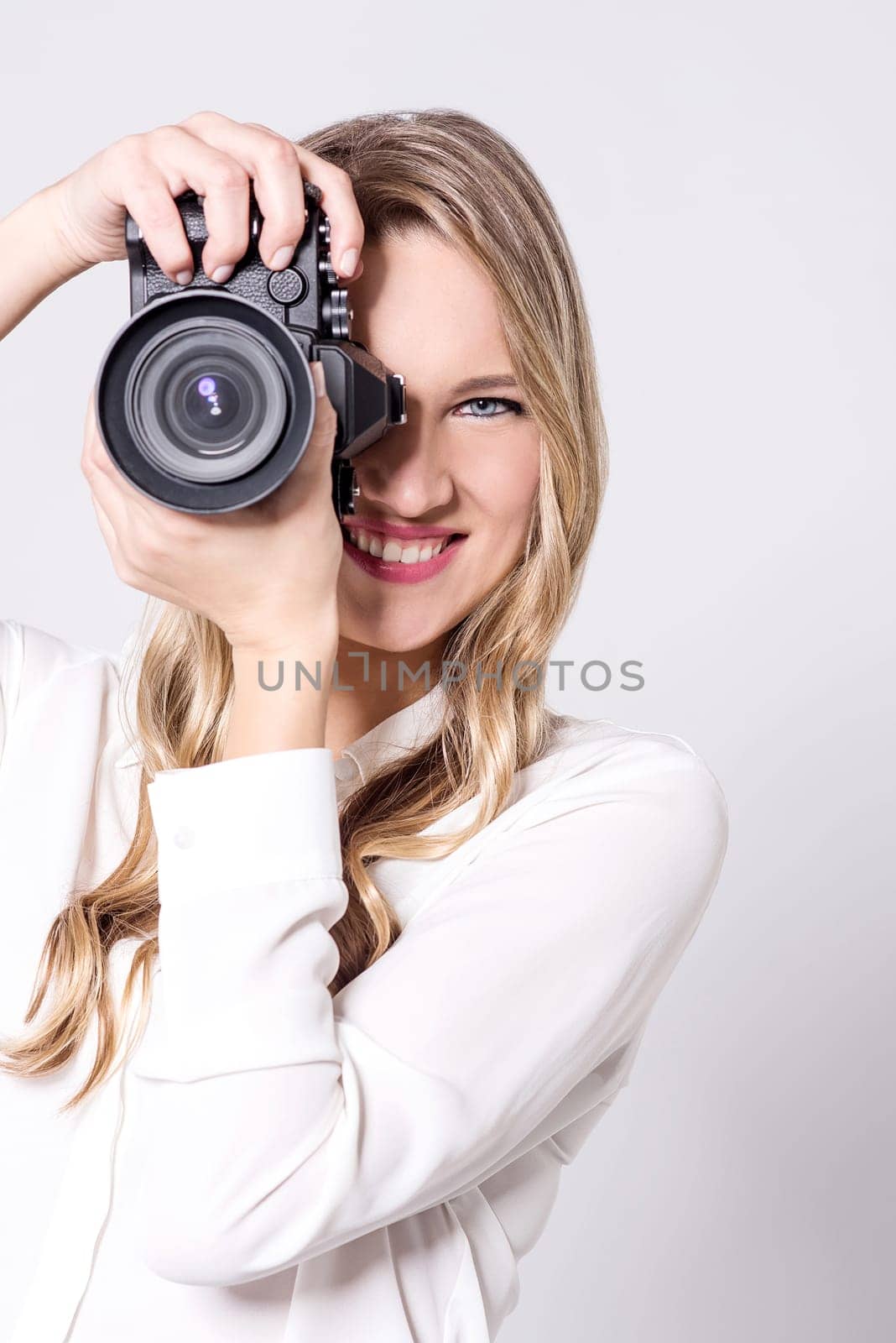 Female photographer with professional camera