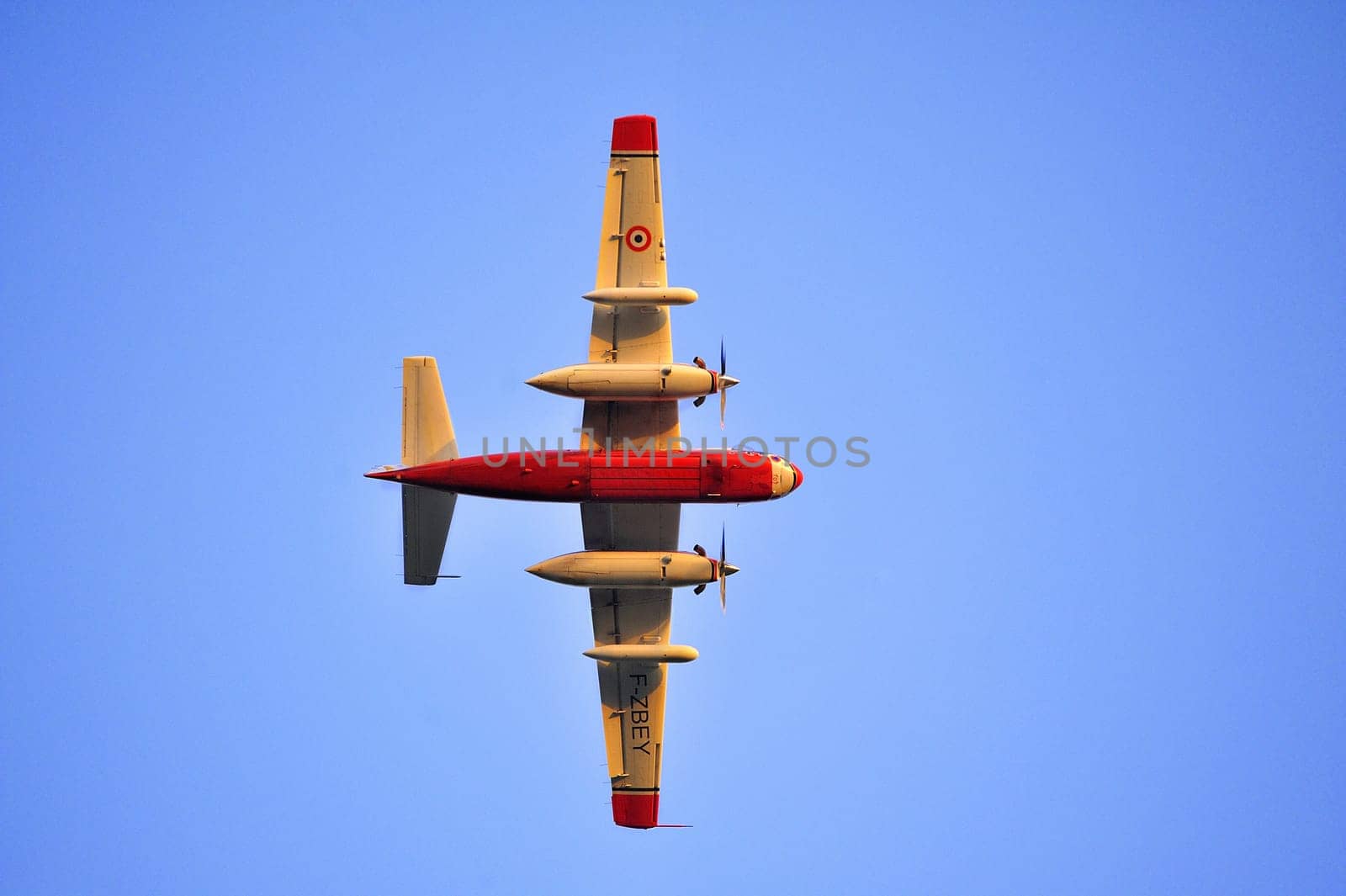 Tracker water bomber in the sky of southern France from extinguishing a forest fire.