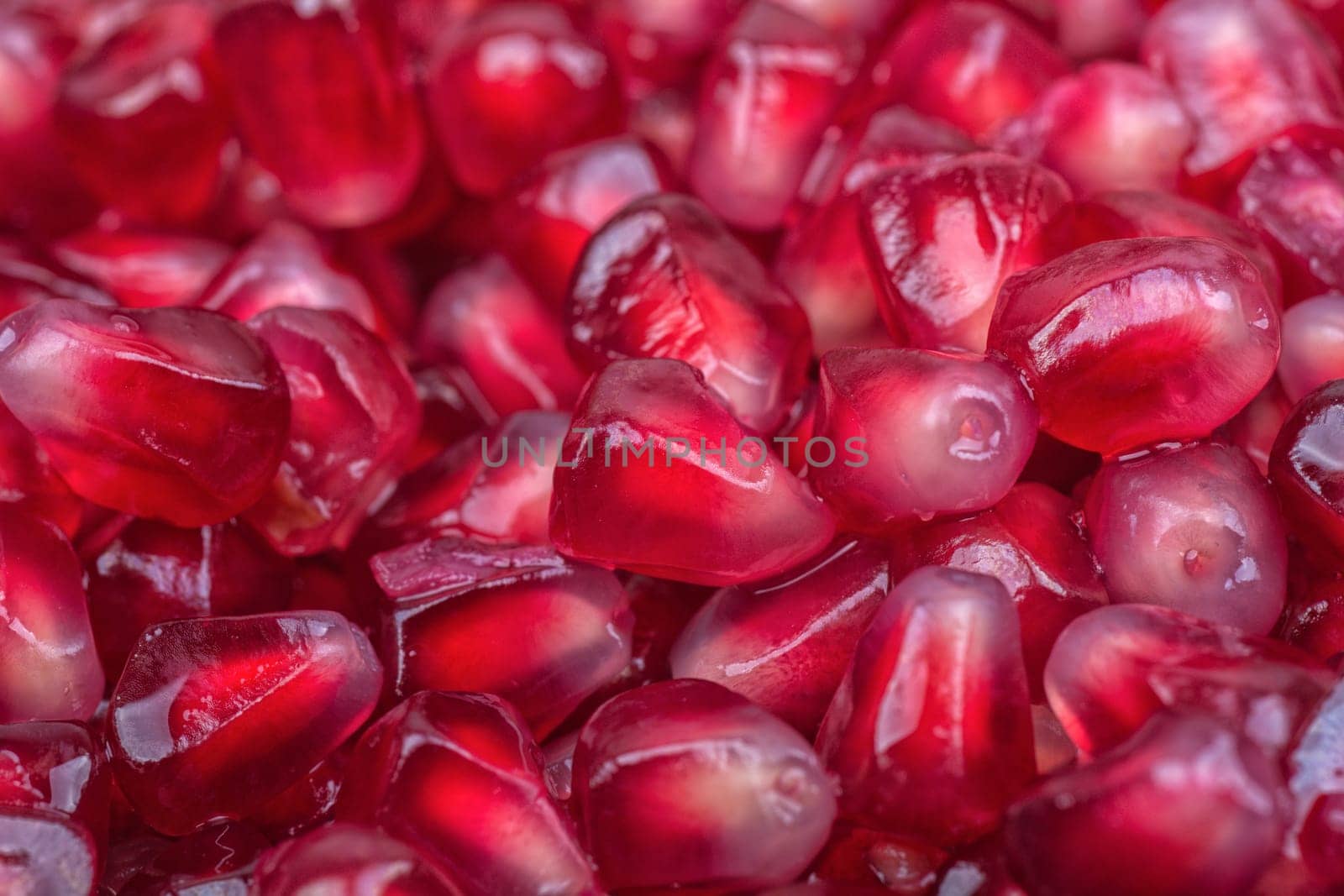 Fresh organic red pomegranate seeds