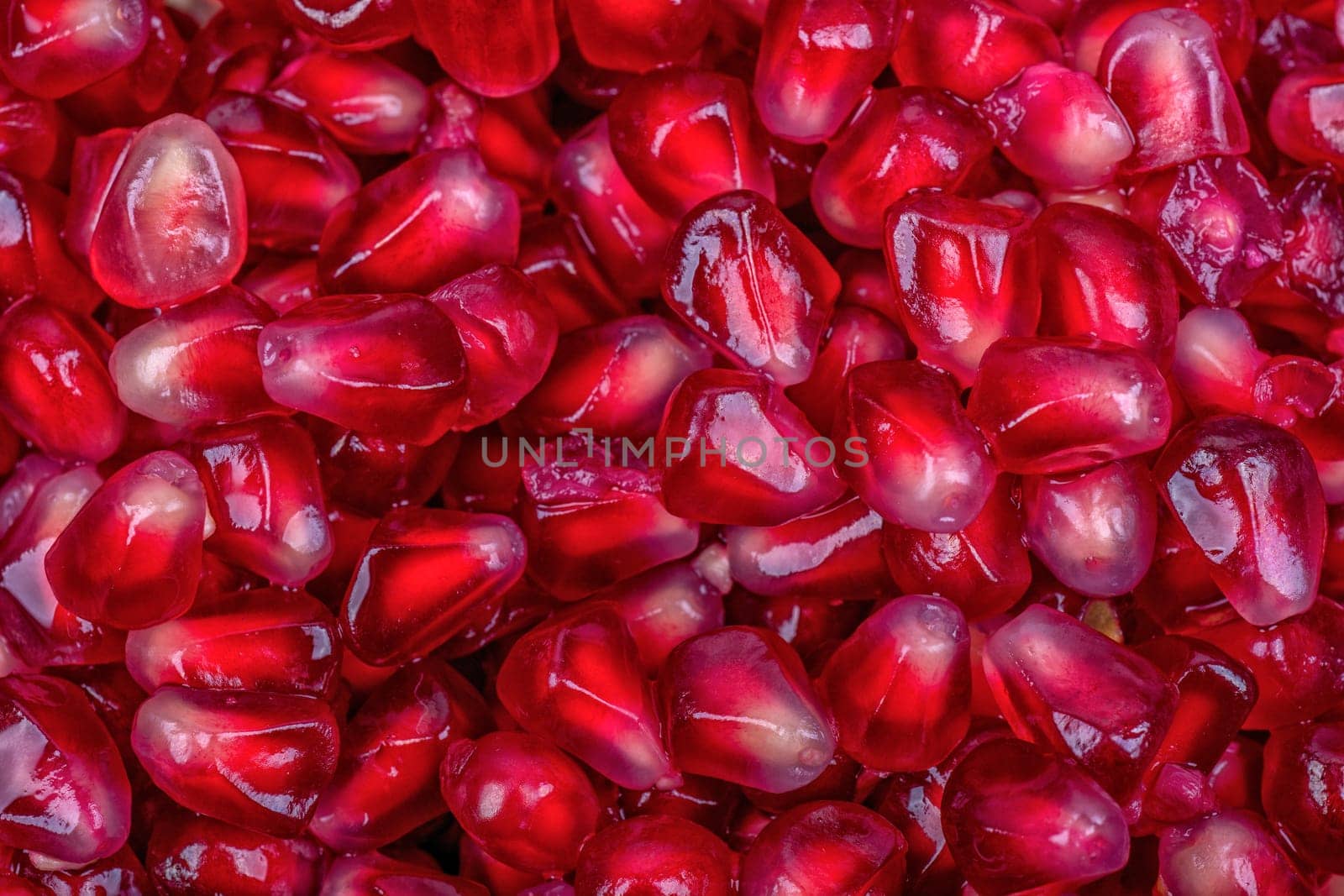 Fresh organic red pomegranate seeds