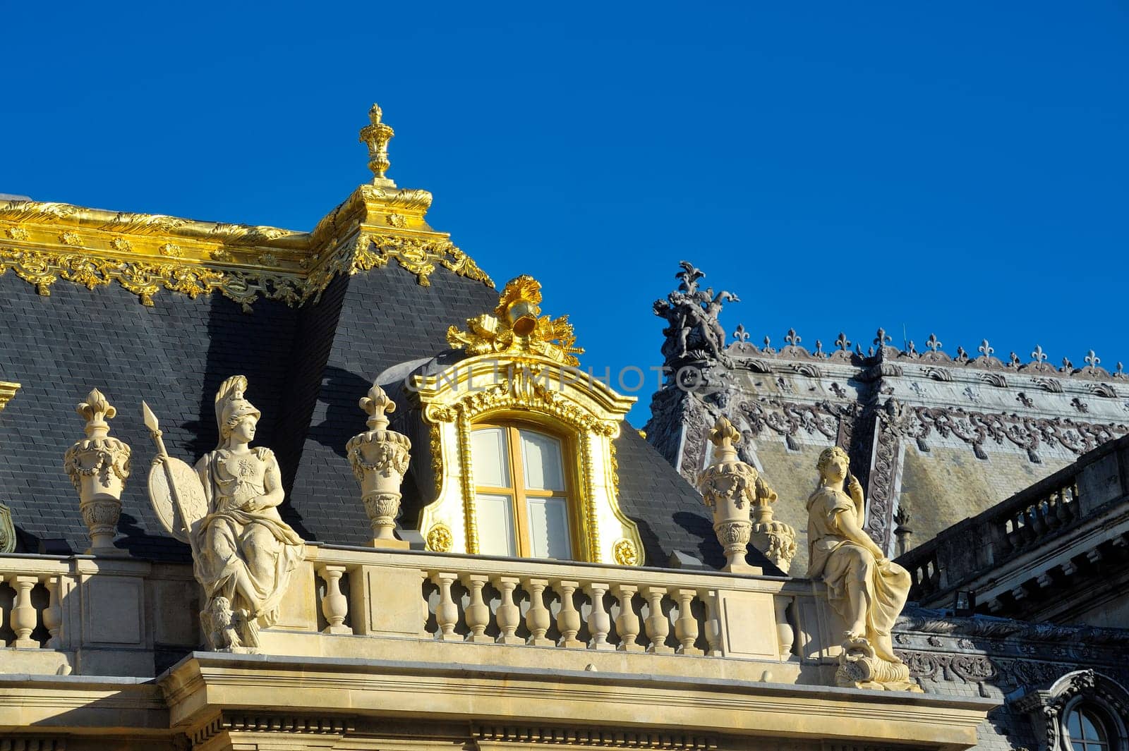 chateau de Versailles, architectural detail and gilding of the facade and roof