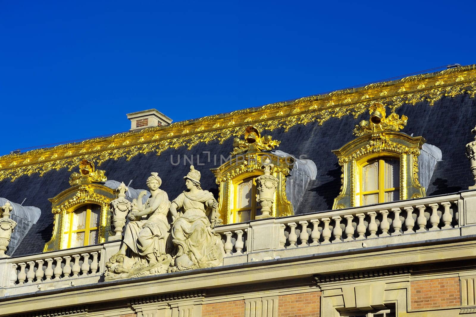 chateau de Versailles, architectural detail and gilding of the facade and roof