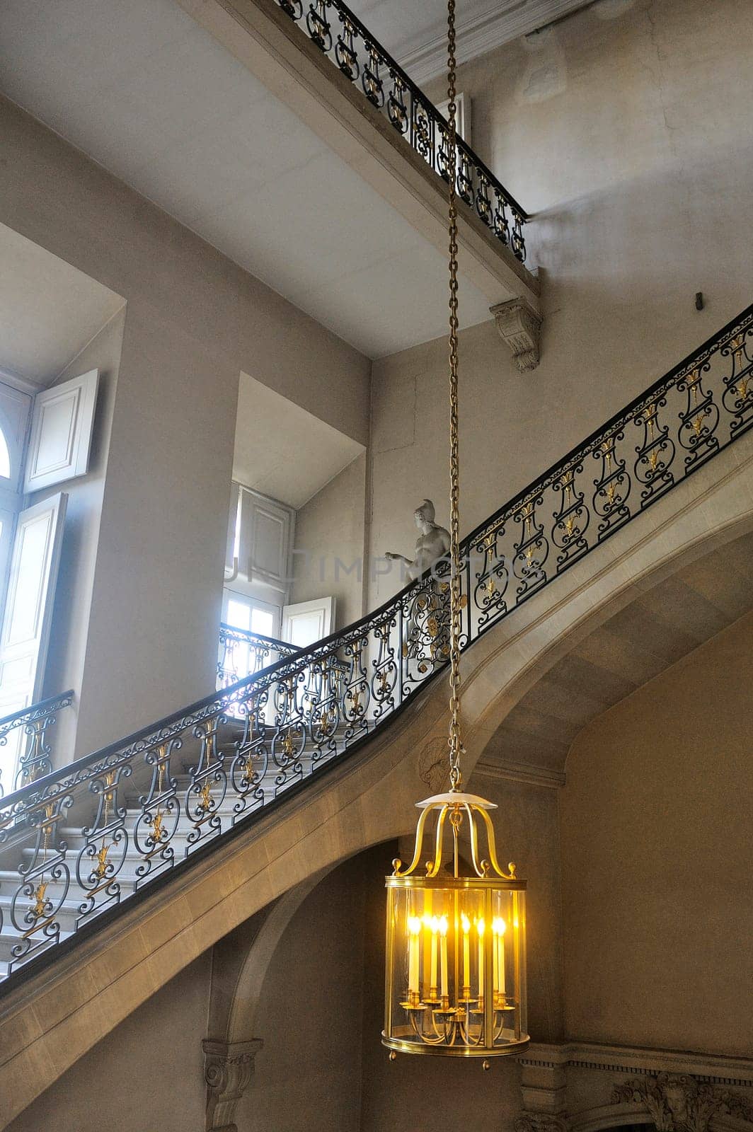 A monumental staircase of the palace of Versailles