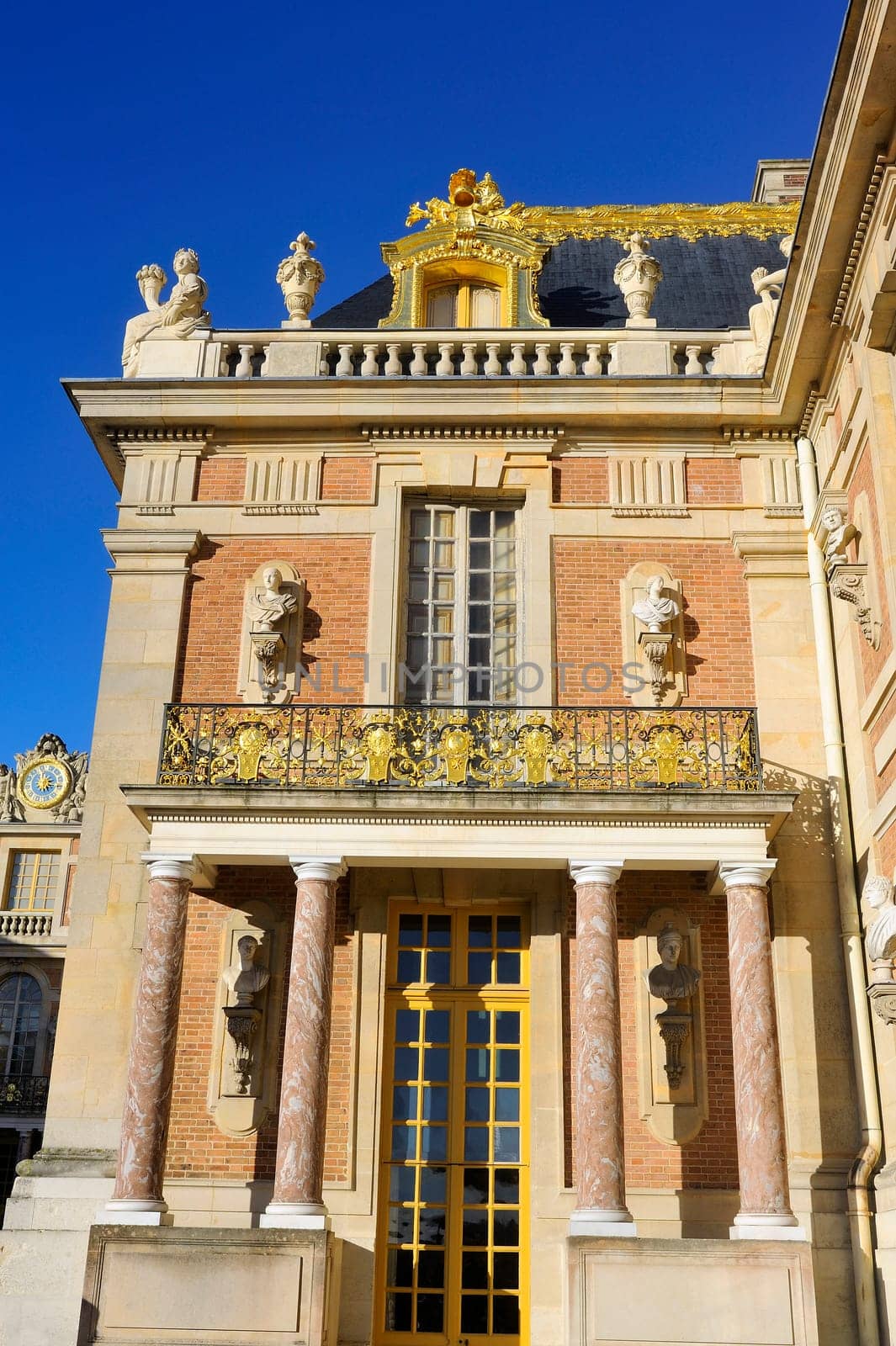 Castle of Versailles, architectural detail and gilding of the facade and roof