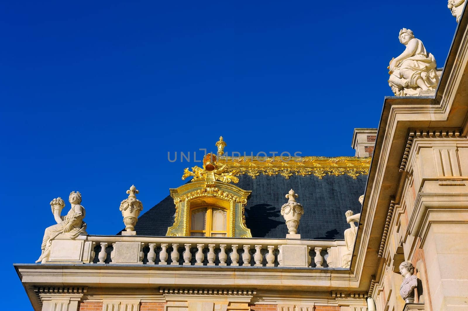 Castle of Versailles, architectural detail and gilding of the facade and roof