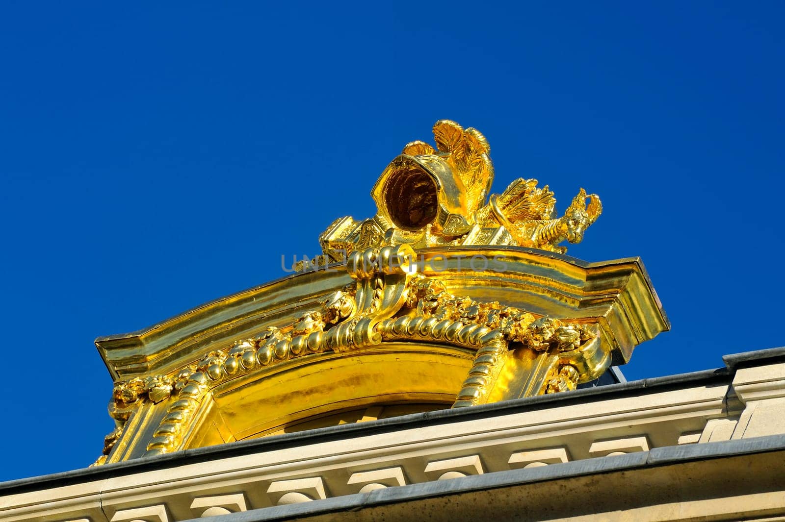 Castle of Versailles, architectural detail and gilding of the facade and roof