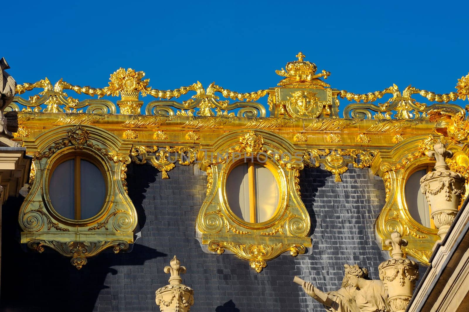 Castle of Versailles, architectural detail and gilding of the facade and roof