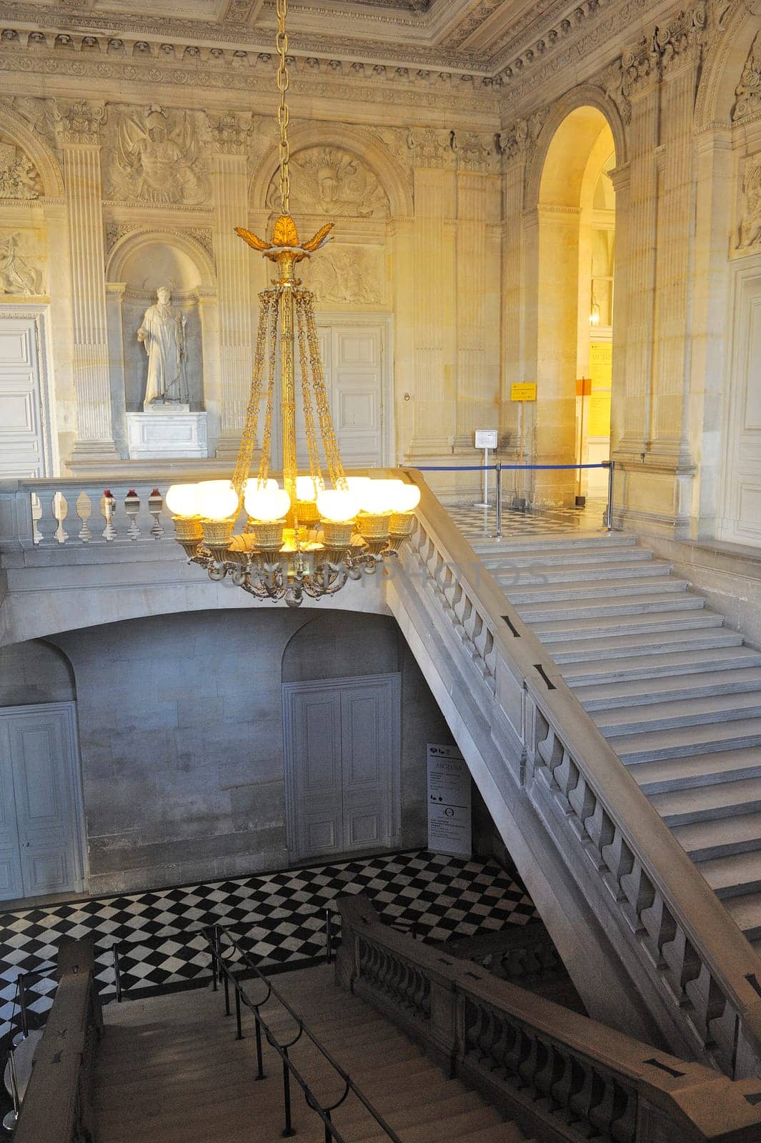 A monumental staircase of the palace of Versailles
