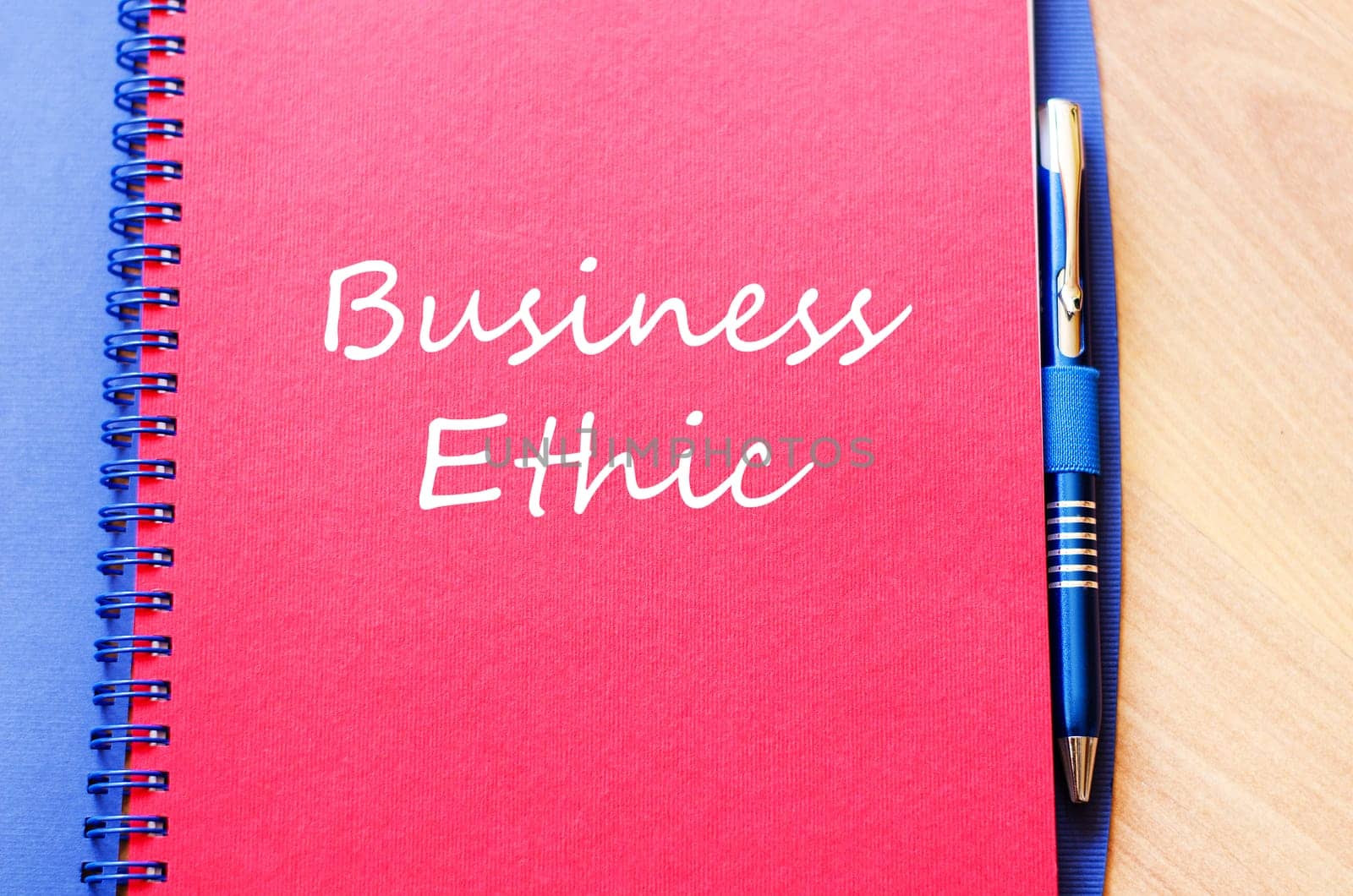 Business ethic text concept write on notebook
