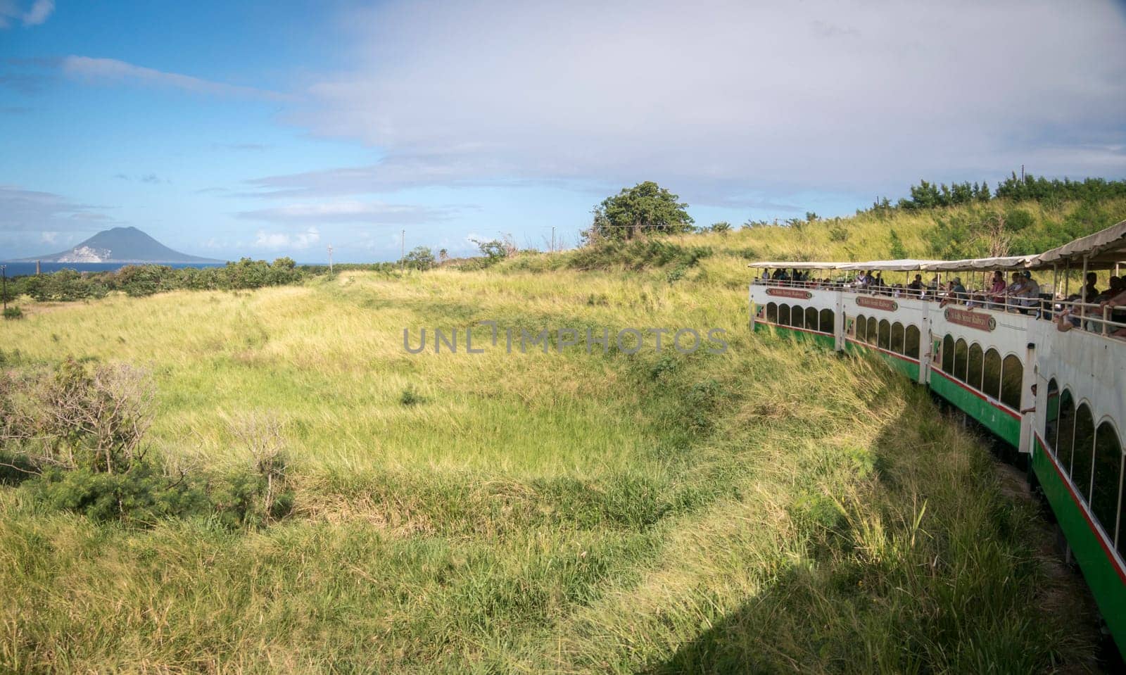 SAINT KITTS, CARIBBEAN, 29 DECEMBER 2015 - The scenic railway on the island of St Kitts with the island of Nevis in the distance