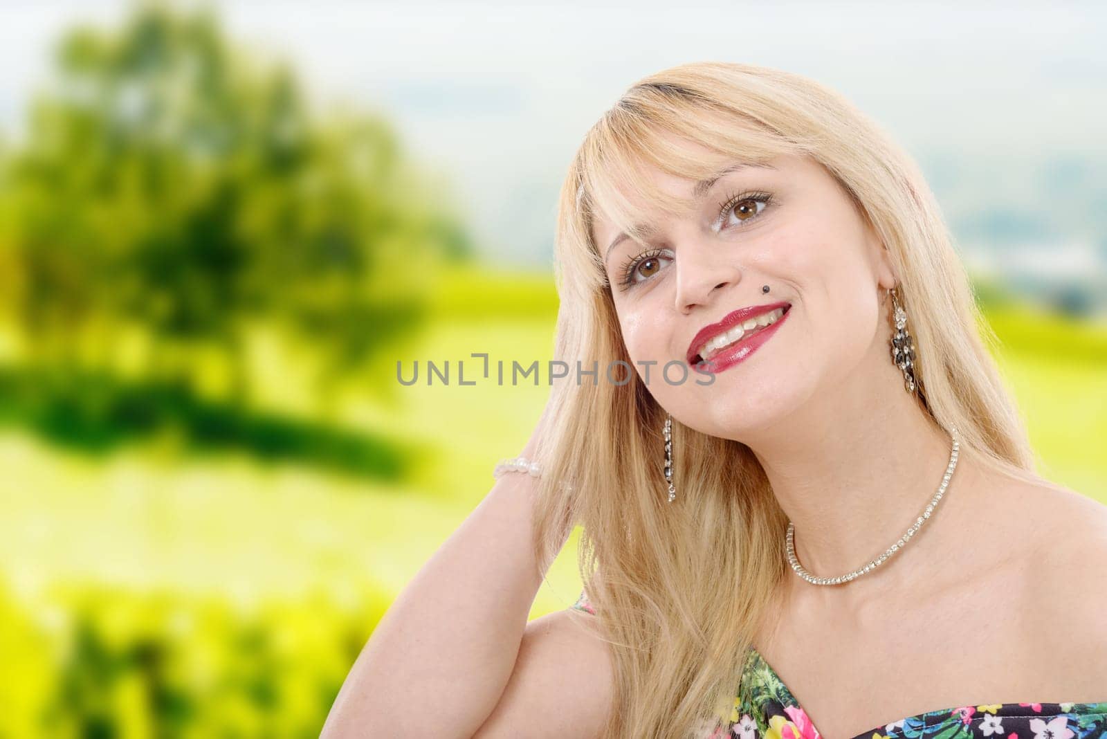 a portrait of pretty young woman with blond hair
