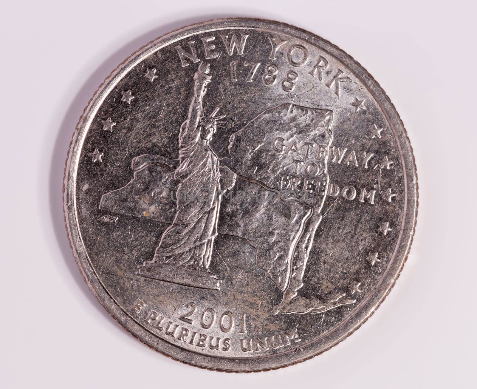 New York Quarter Dollar Close up on white background.