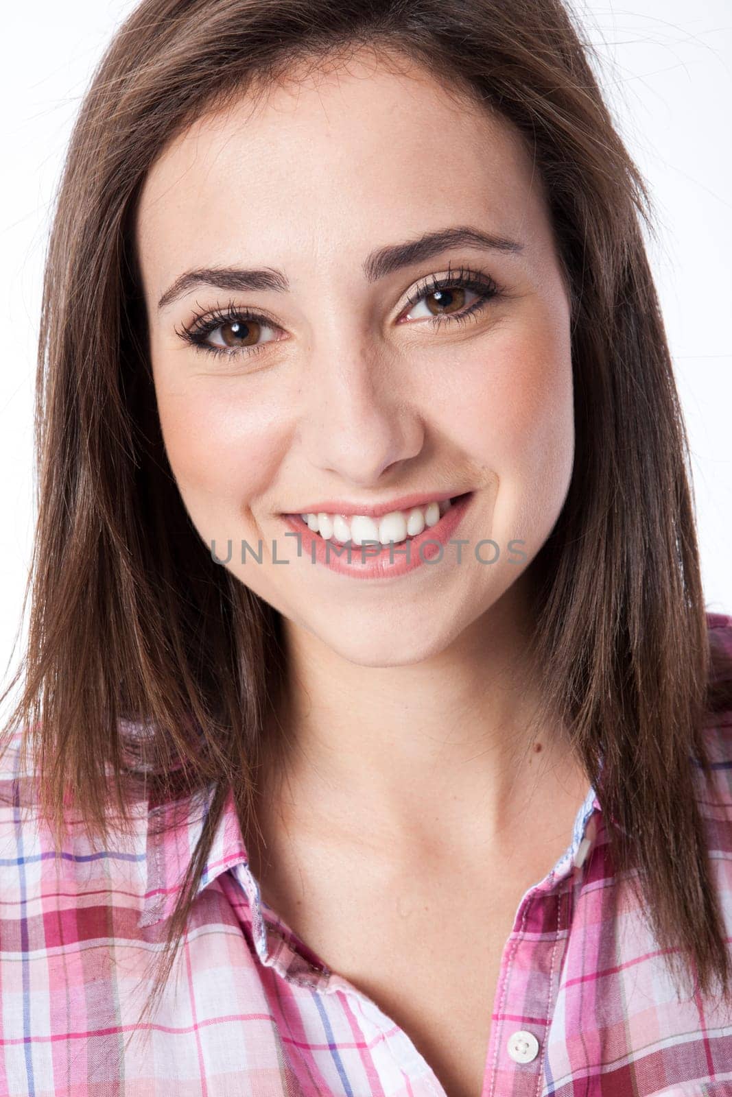 attractive young woman posing in white background