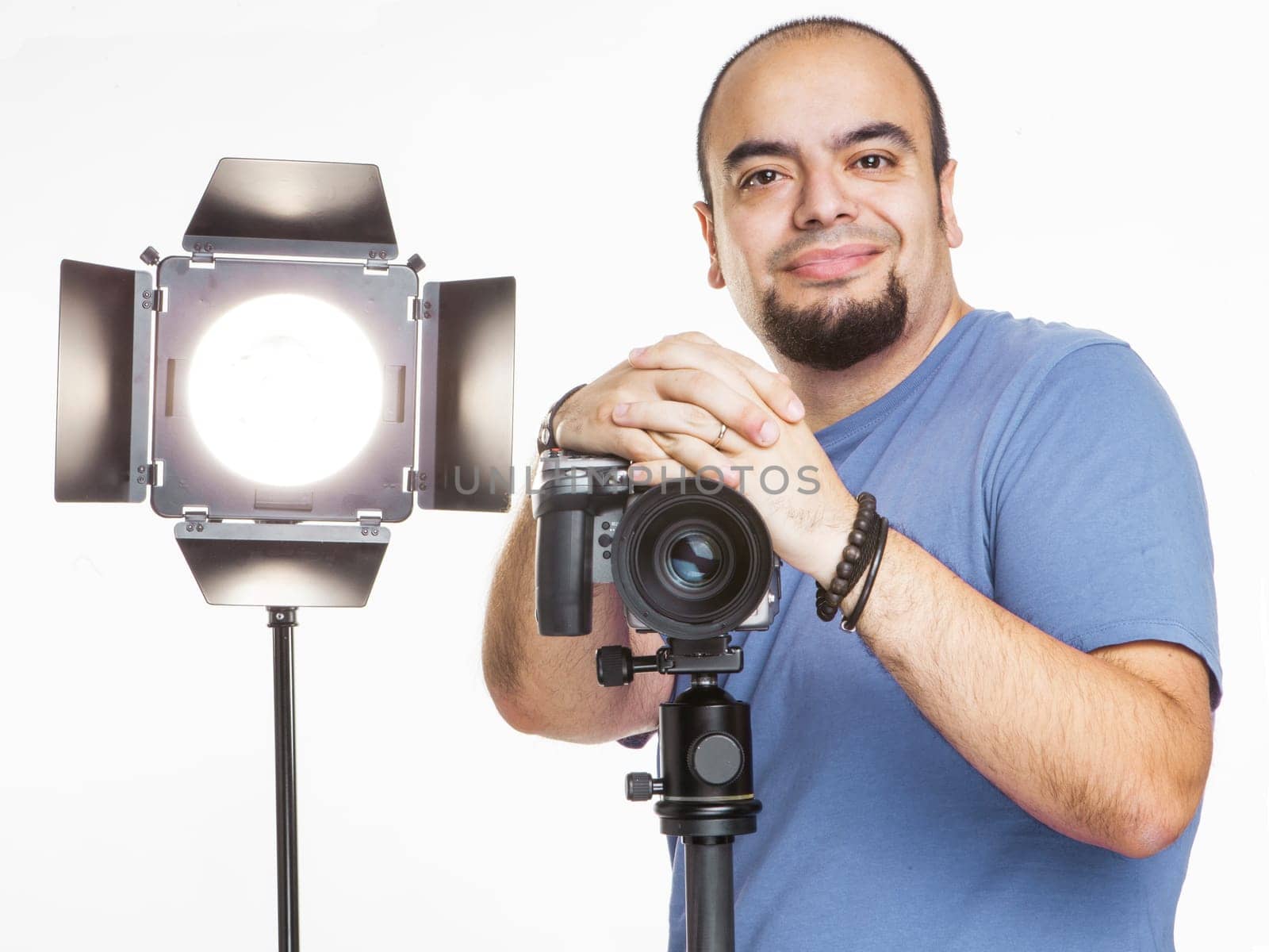 professional photographer in the studio in clear background