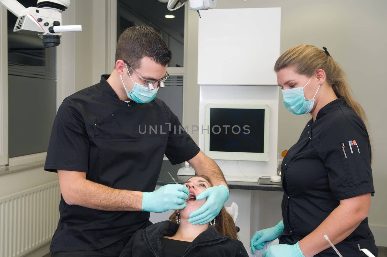 Patient getting a treatment at the dental practice