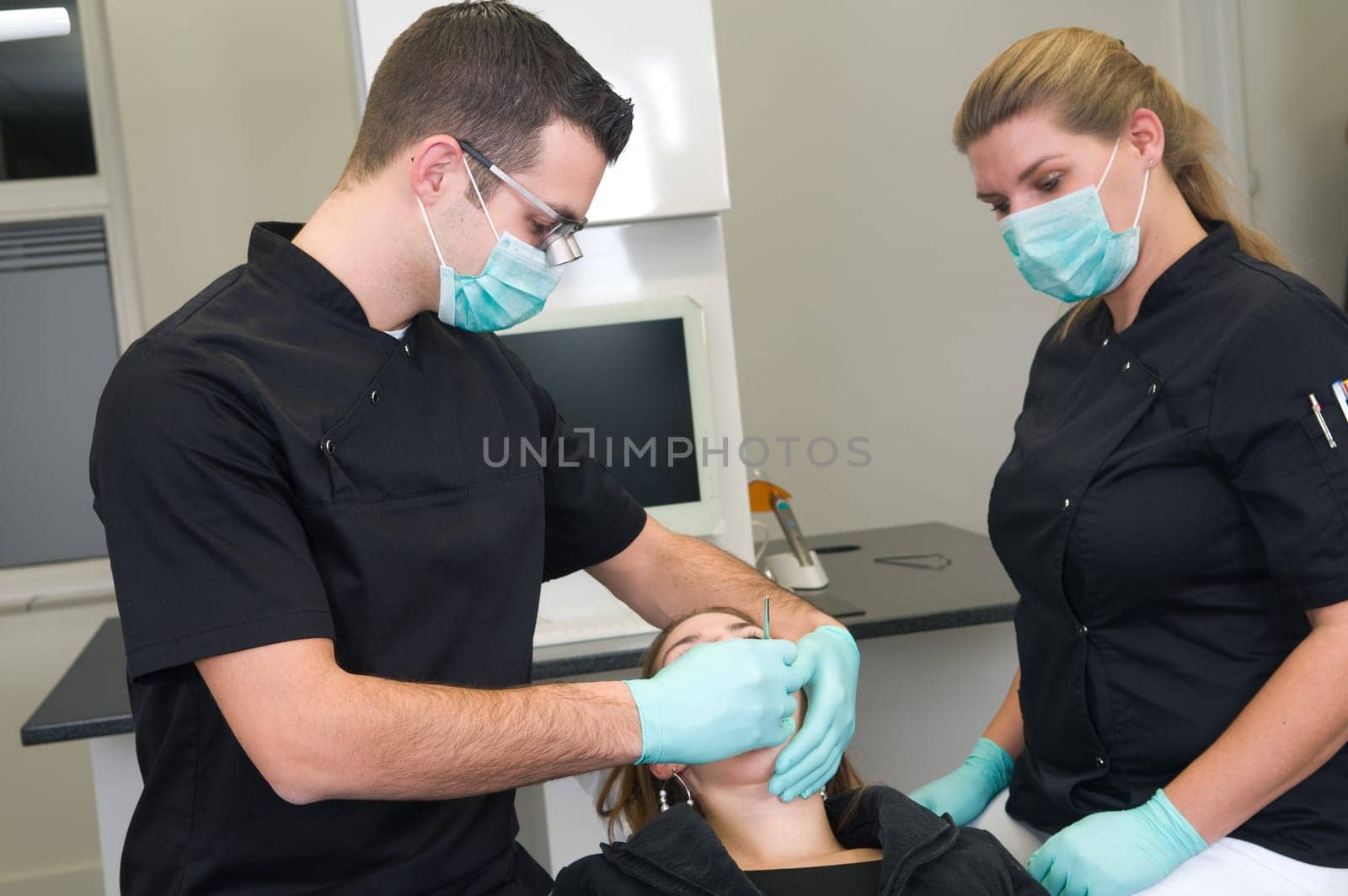 Patient getting a treatment at the dental practice