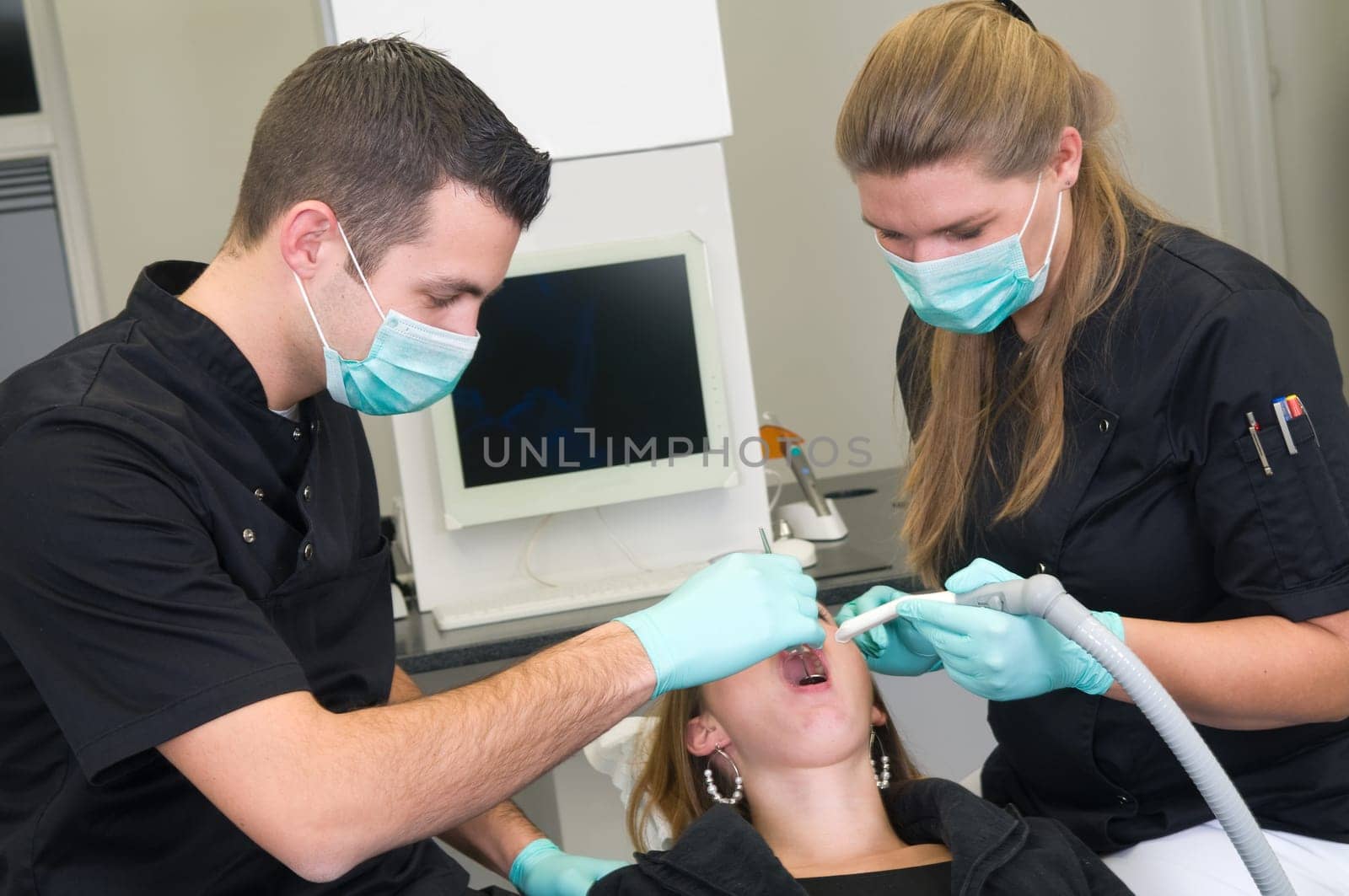 Patient getting a treatment at the dental practice
