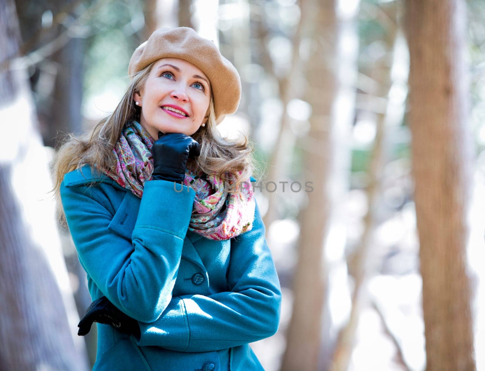 blond casual woman happy outdoors in the woods