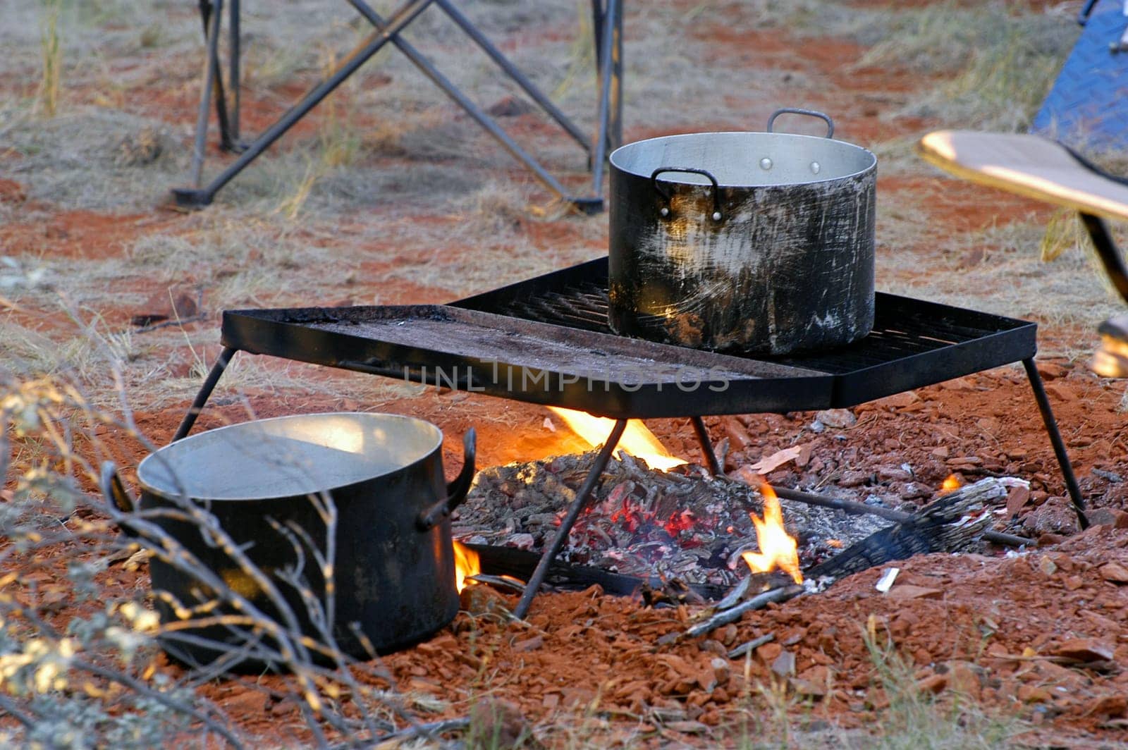Cook on a campfire in the Australian outback