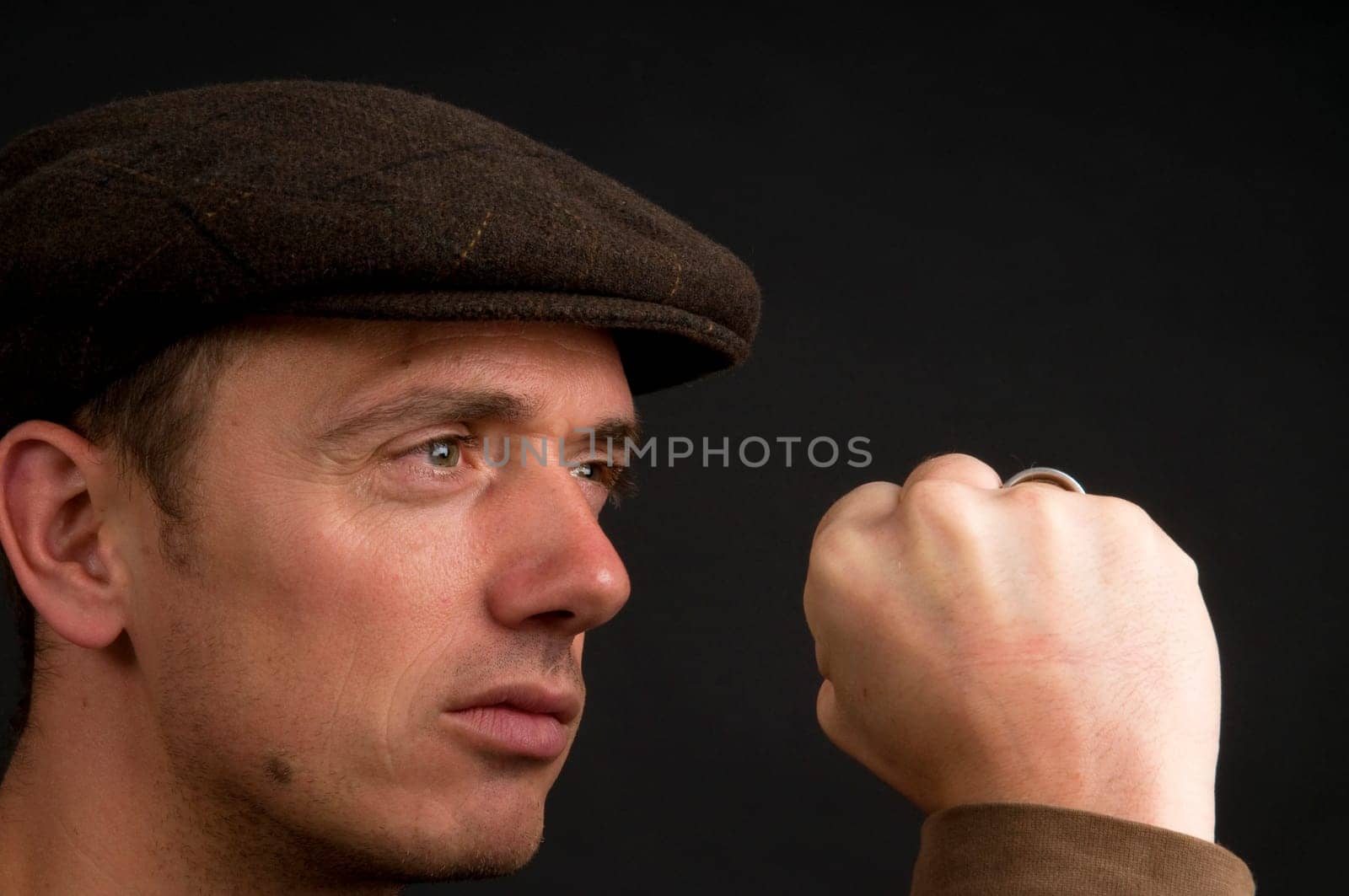 Young man showing his fist