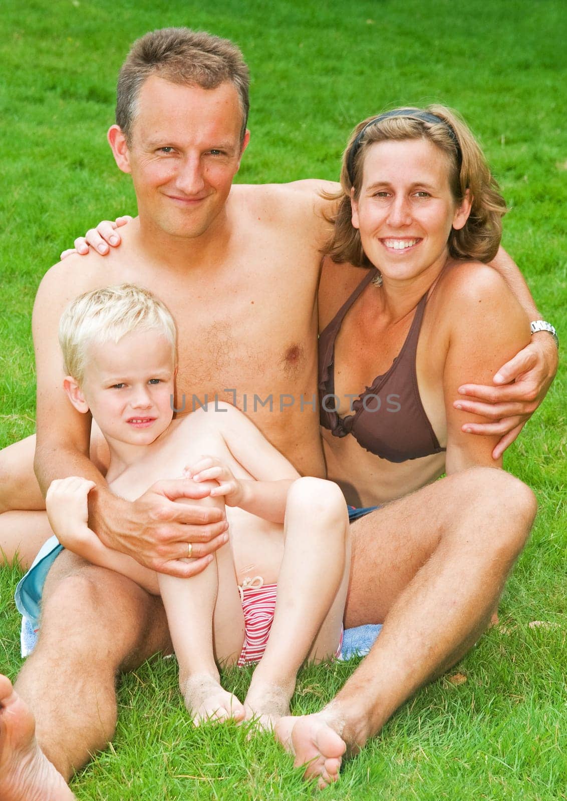 A happy family portrait in summertime.