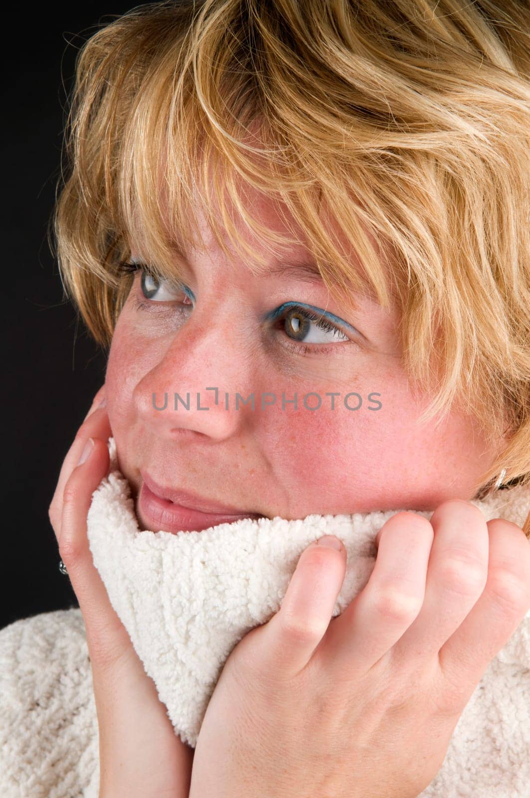 Beautiful girl wearing a warm sweater, it's getting colder.