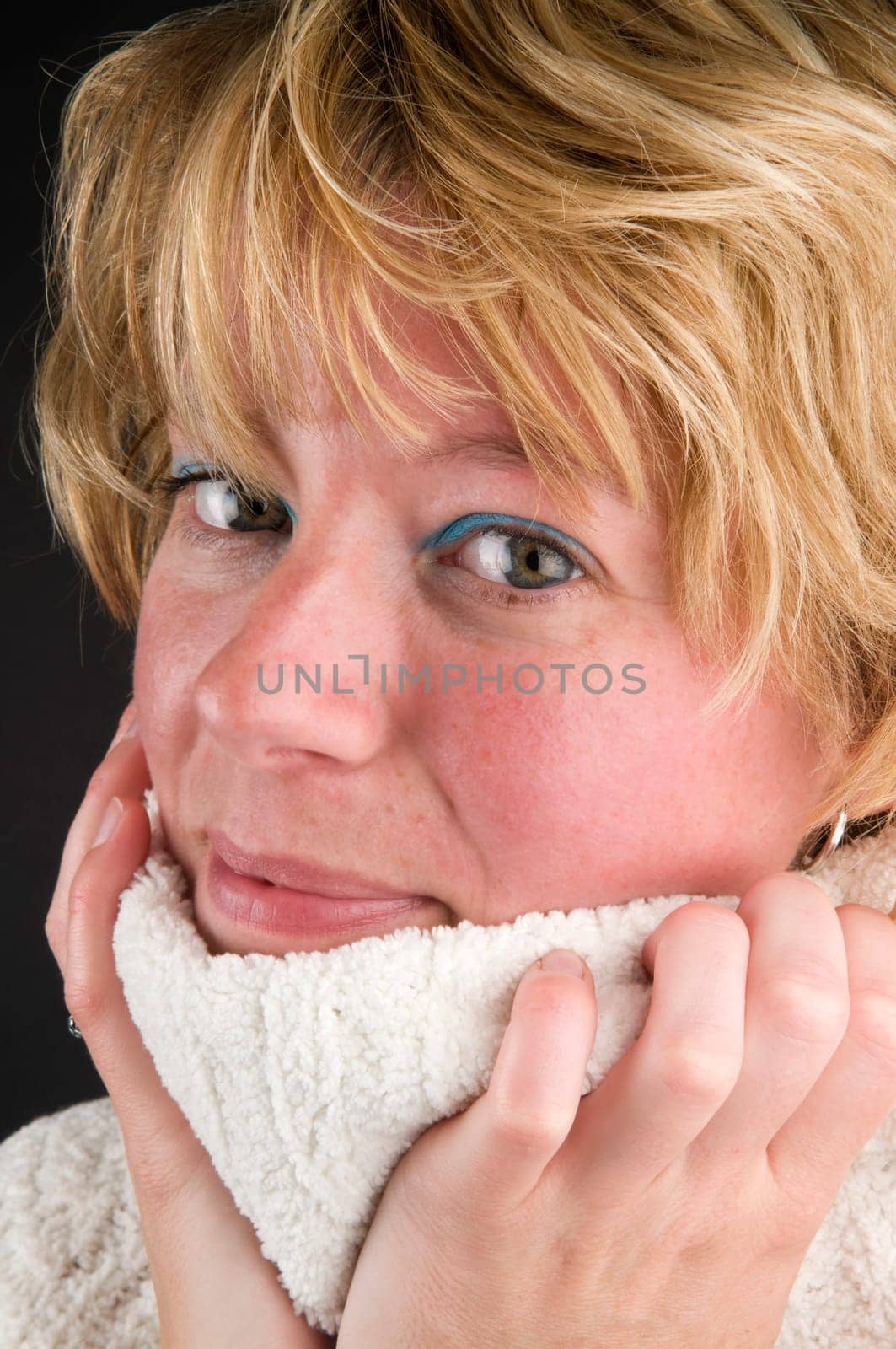 Beautiful girl wearing a warm sweater, it's getting colder.