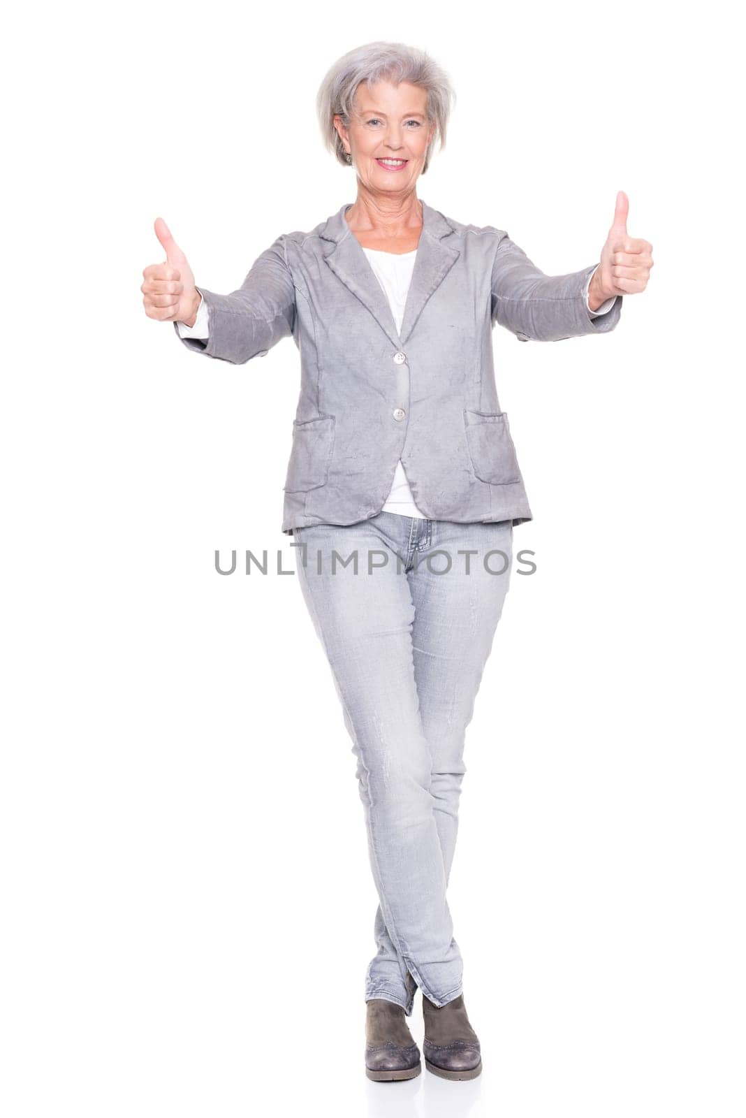 Studio recording of a smiling senior woman against a white background