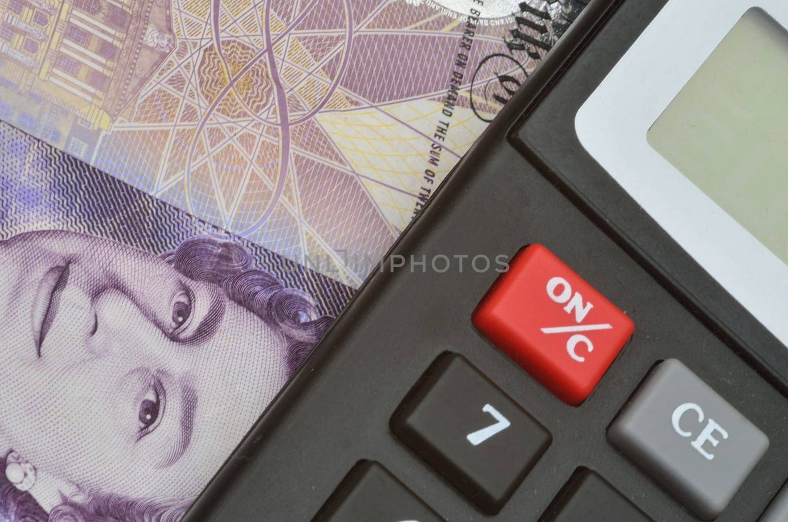 Detail of banknote and calculator