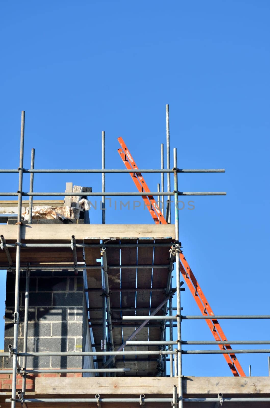 Ladder at angle on building site