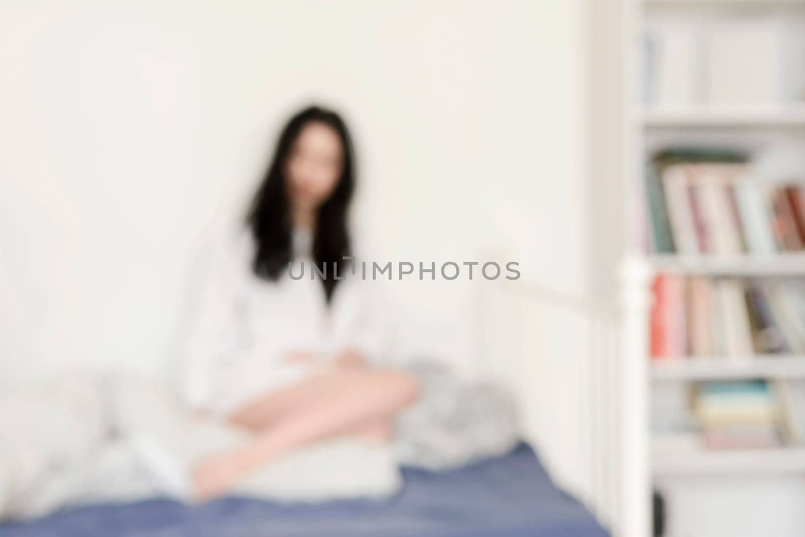 young woman in bed,fuzzy