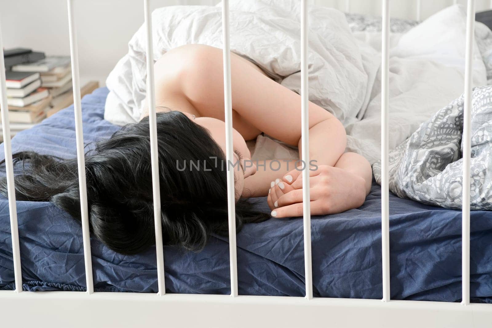 young woman in bed