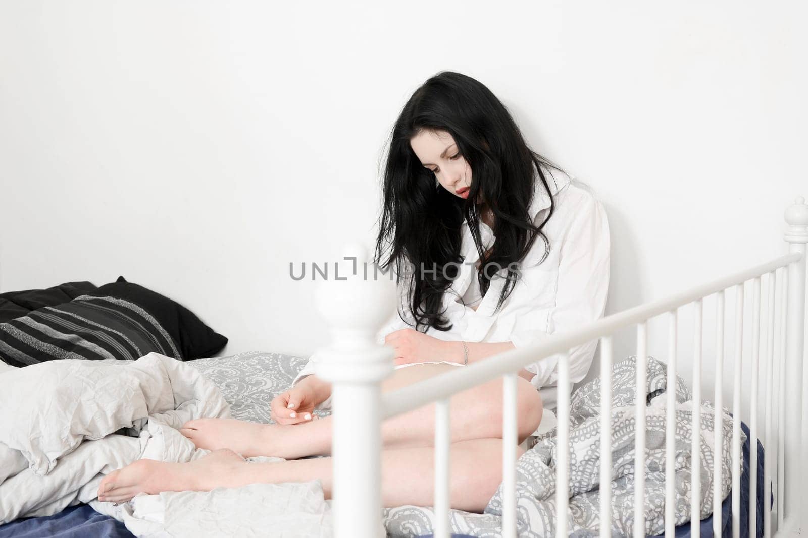 young woman in bed