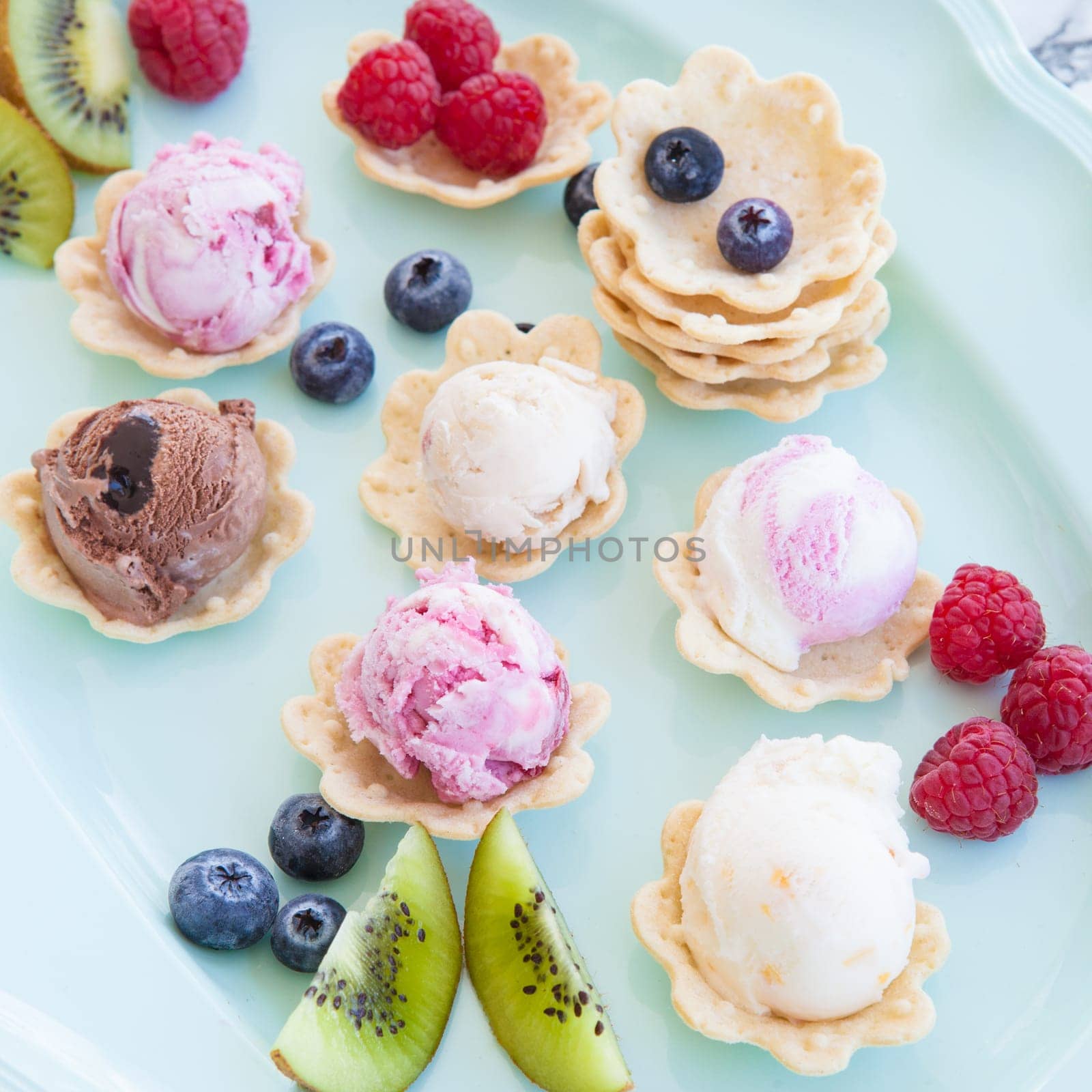 Various balls of ice cream in small bowls