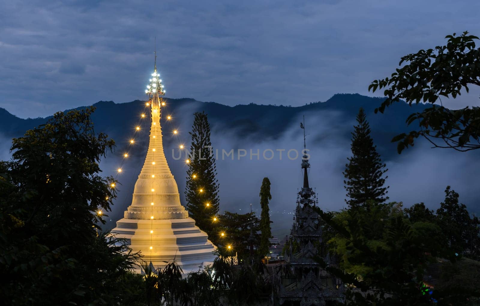 Wat Phra That Doi Kong Mu illuminated at dawn, Mae Hong Son, Thailand.