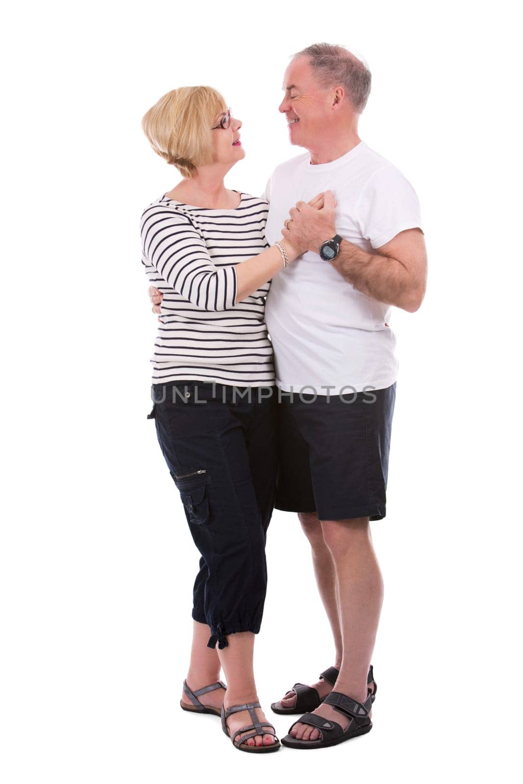retired couple wearing casual outfits on white isolated background